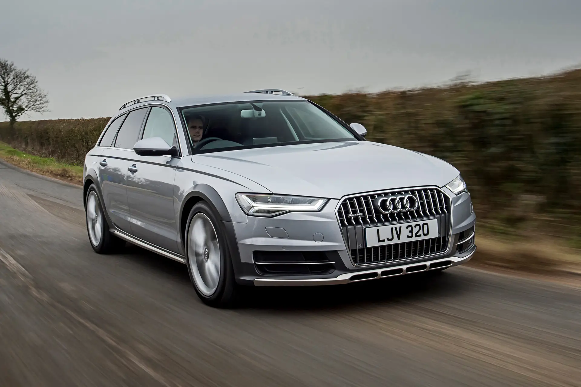 Audi A6 Allroad (2012-2018) Review: Exterior front three quarter photo of the Audi A6 Allroad on the road
