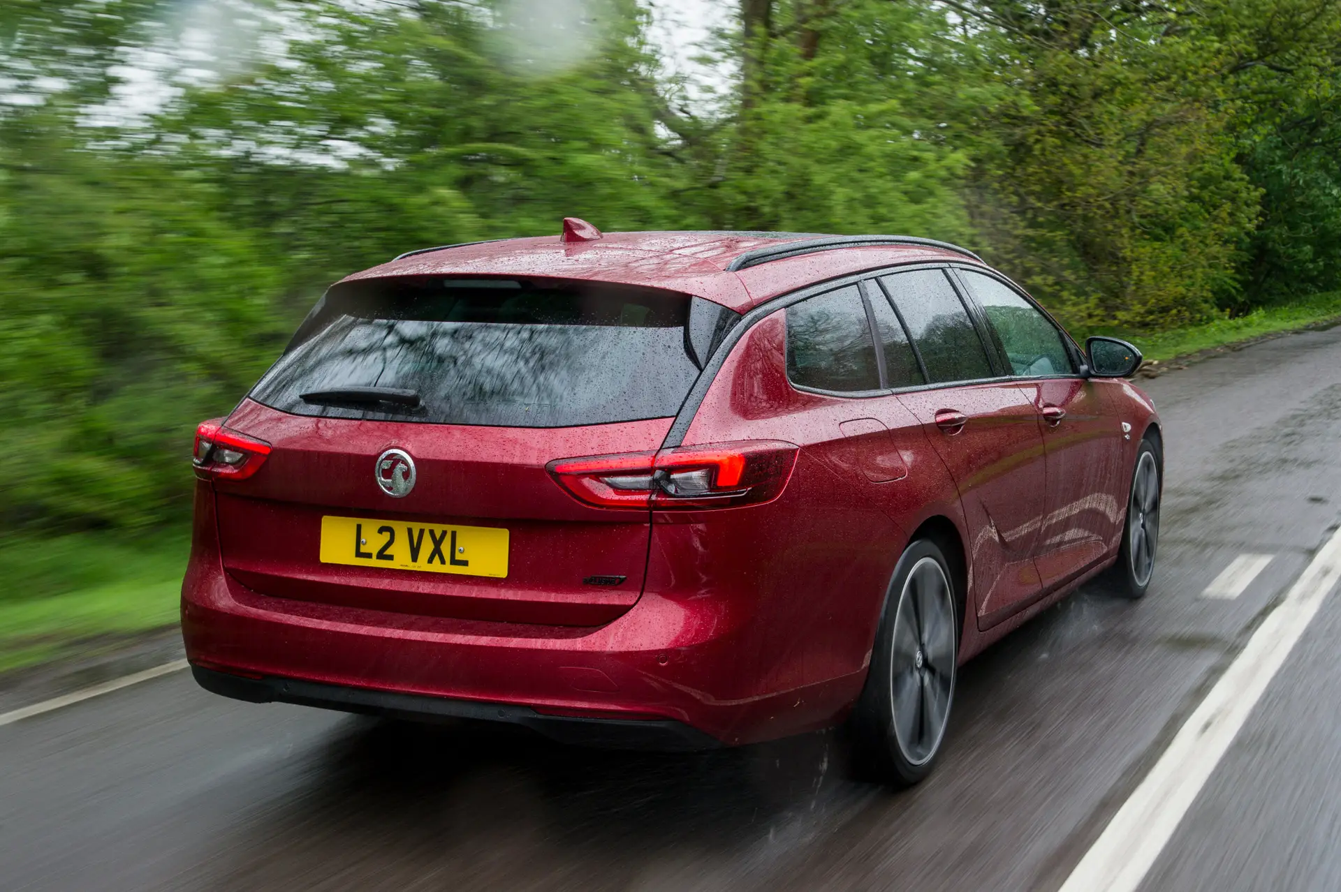Used Vauxhall Insignia Sports Tourer (2017-2019) Review: exterior rear three quarter photo of the Vauxhall Insignia Sports Tourer on the road