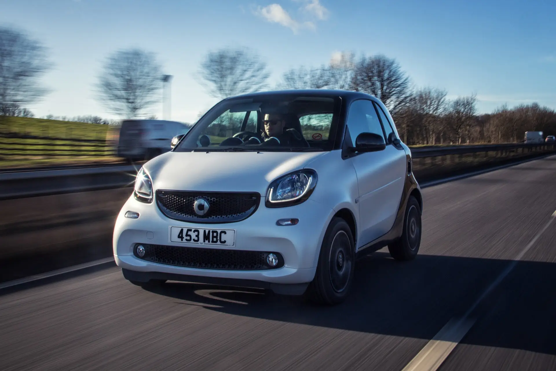Smart Fortwo Coupe (2014-2019) Review: exterior front three quarter photo of the Smart Fortwo Coupe on the road