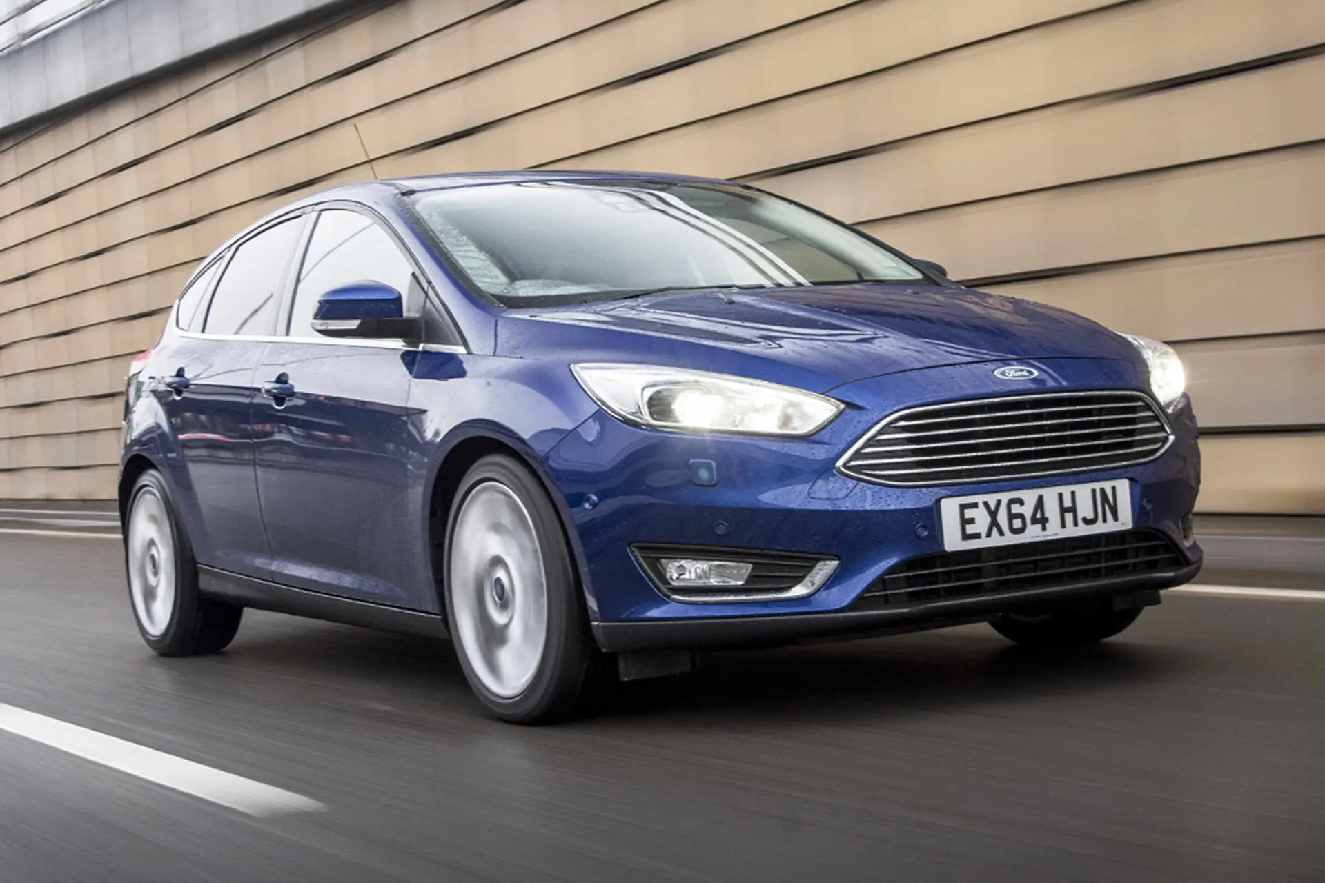 Ford Focus (2014-2018) Review: exterior front three quarter photo of the Ford Focus on the road