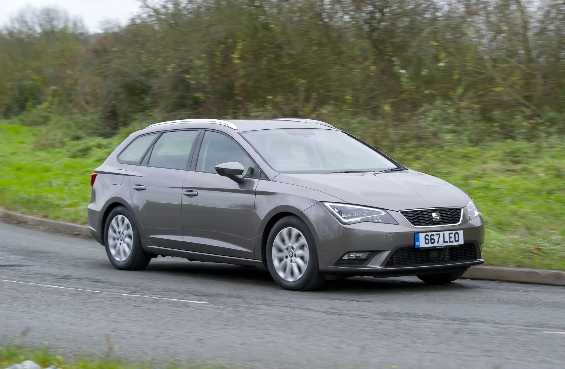 SEAT Leon ST (2014-2020) Review: exterior front three quarter photo of the SEAT Leon ST on the road