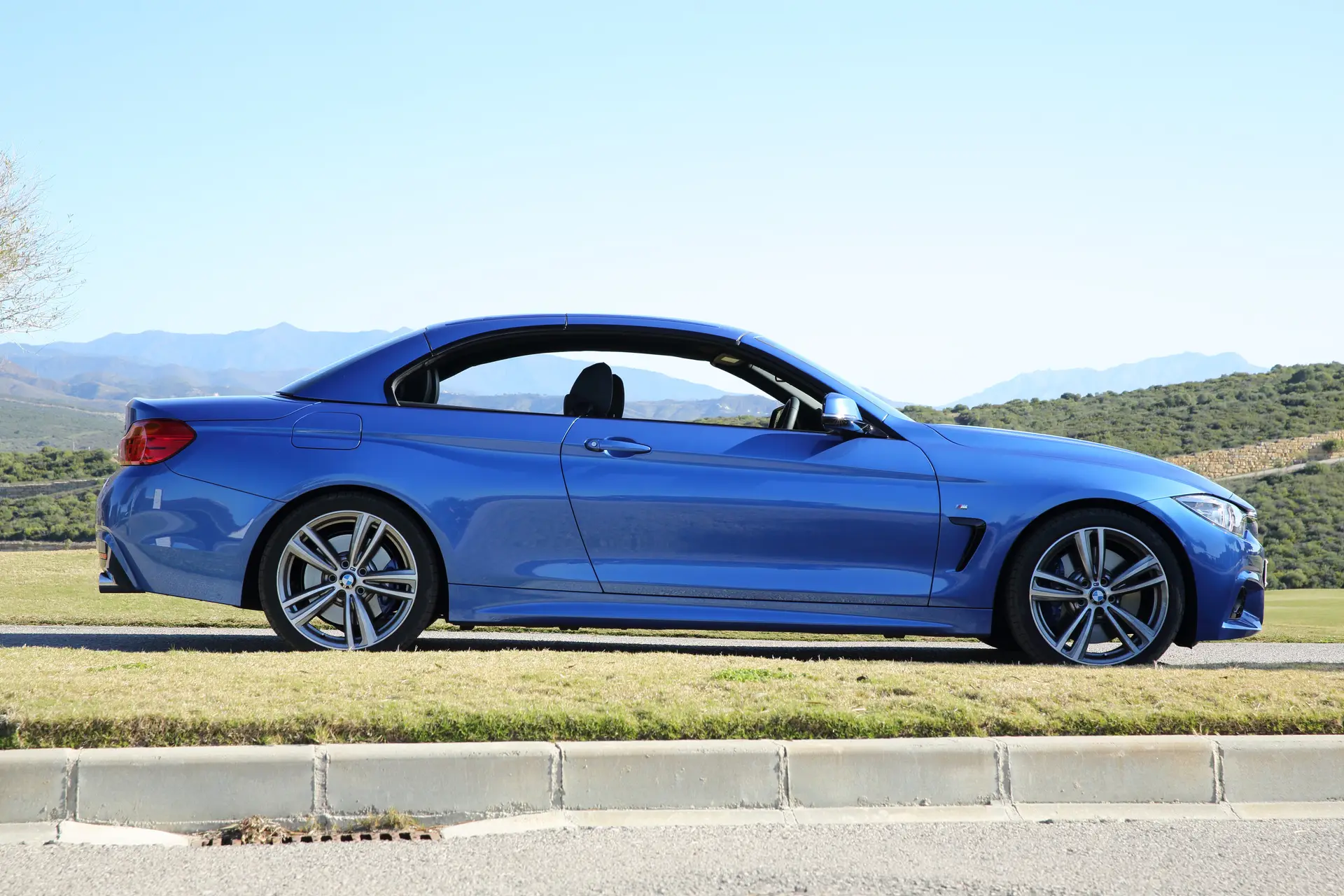 BMW 4 Series Convertible (2014-2020) Review: exterior side photo of the BMW 4 Series Convertible 