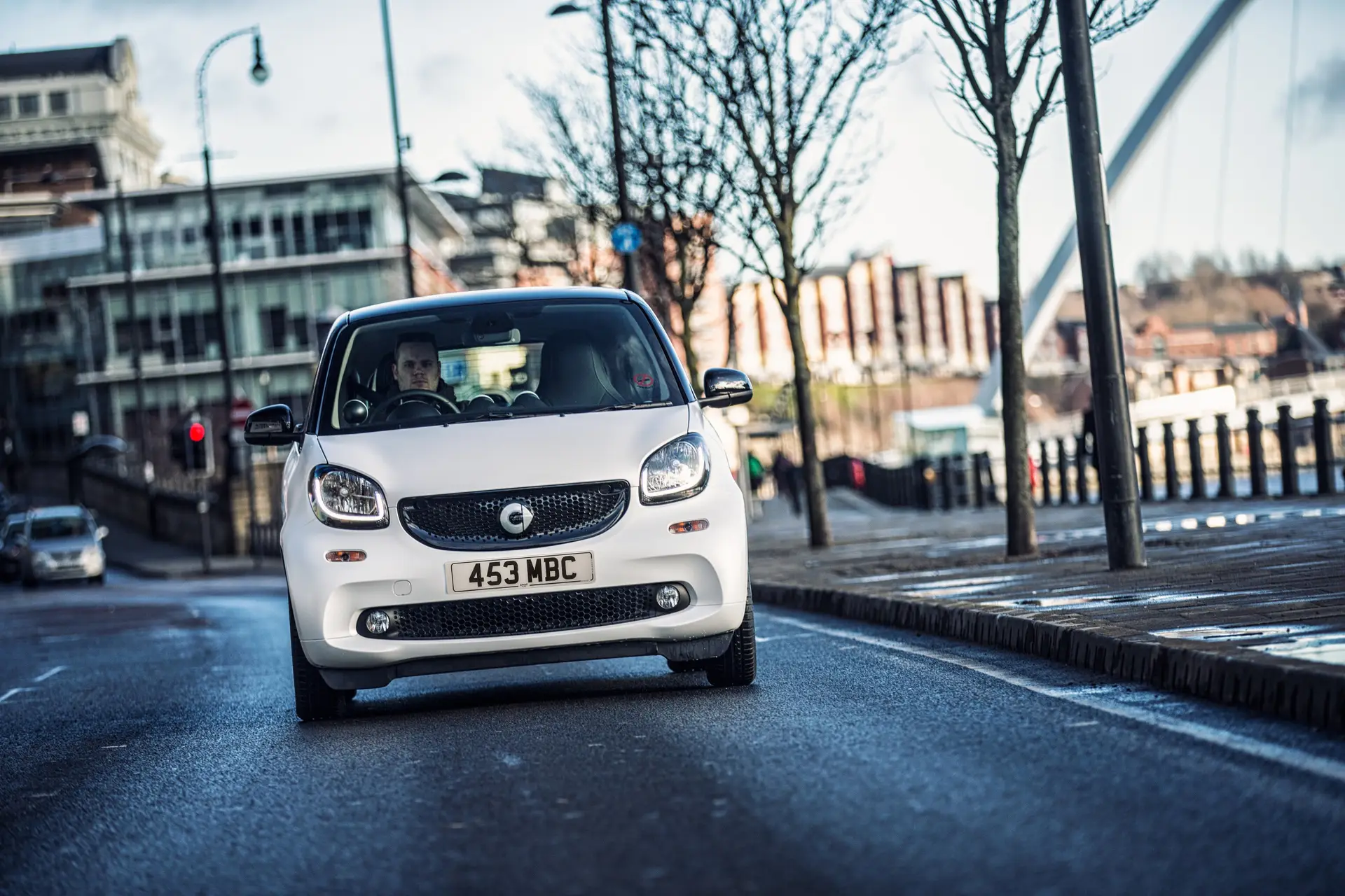 Smart Fortwo Coupe (2014-2019) Review: exterior front photo of the Smart Fortwo Coupe on the road