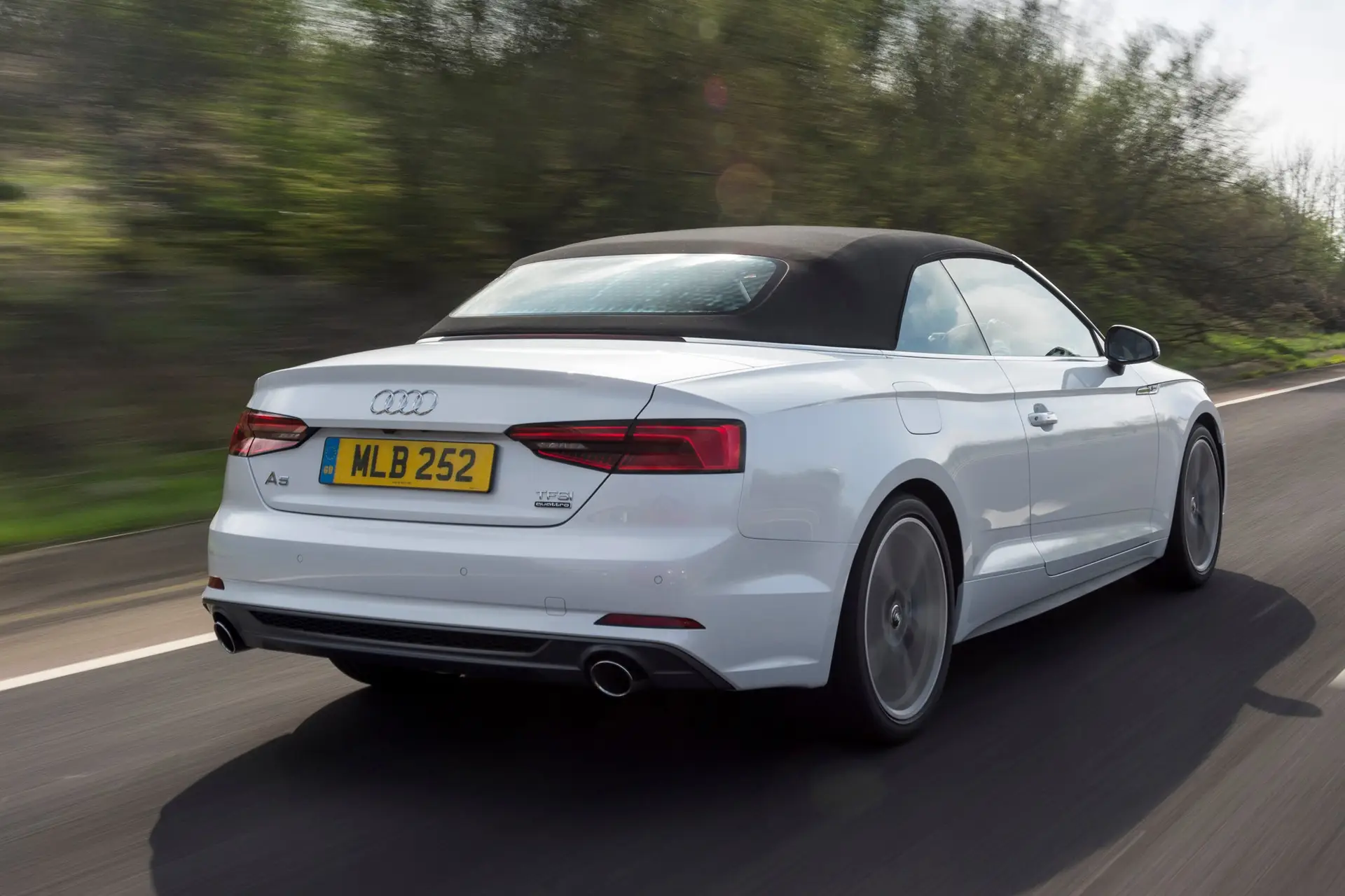 Audi A5 Cabriolet Review 2023: exterior rear three quarter photo of the Audi A5 Cabriolet on the road 
