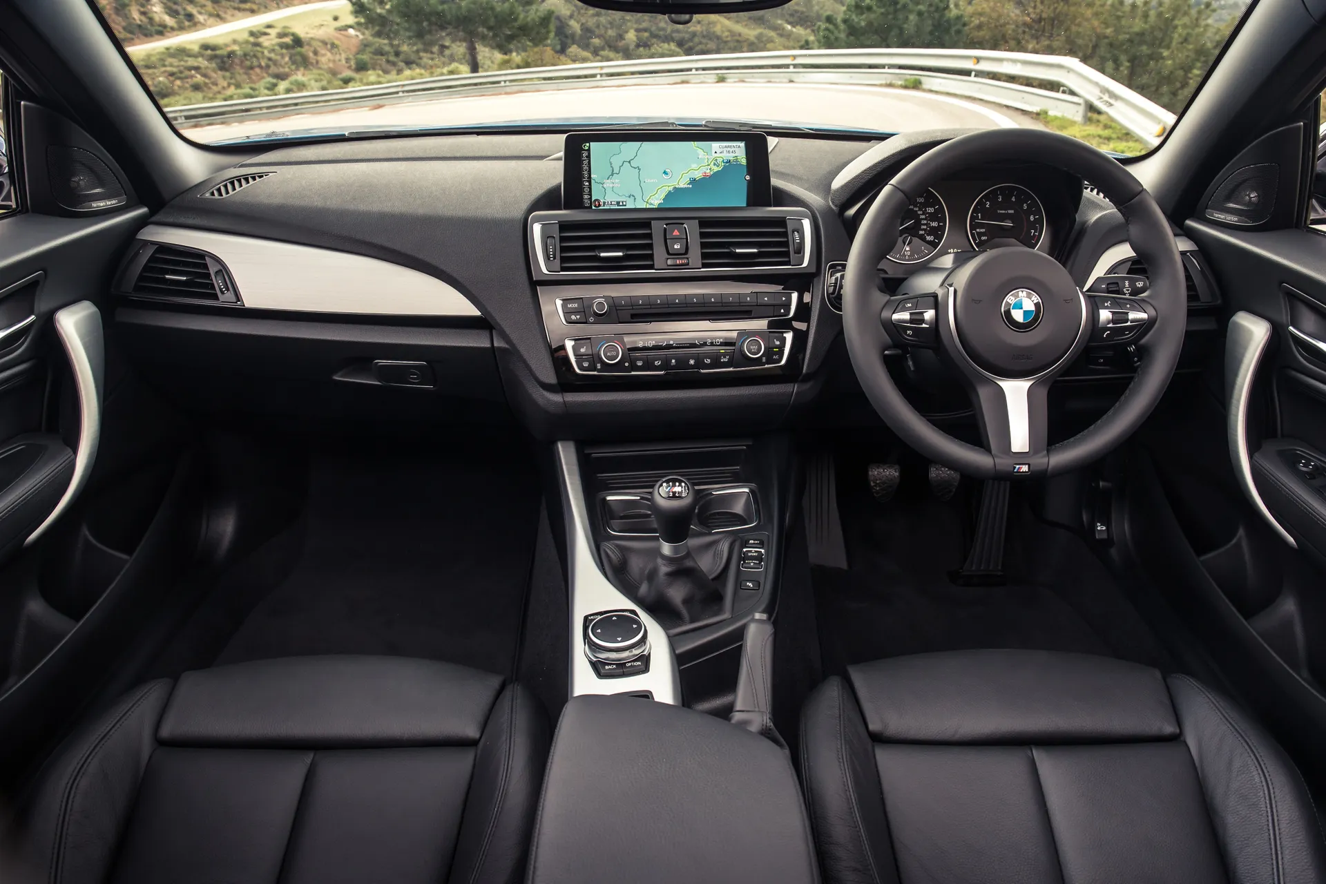 BMW 2 Series Cabriolet (2015-2021) Review: interior close up photo of the BMW 2 Series Convertible dashboard