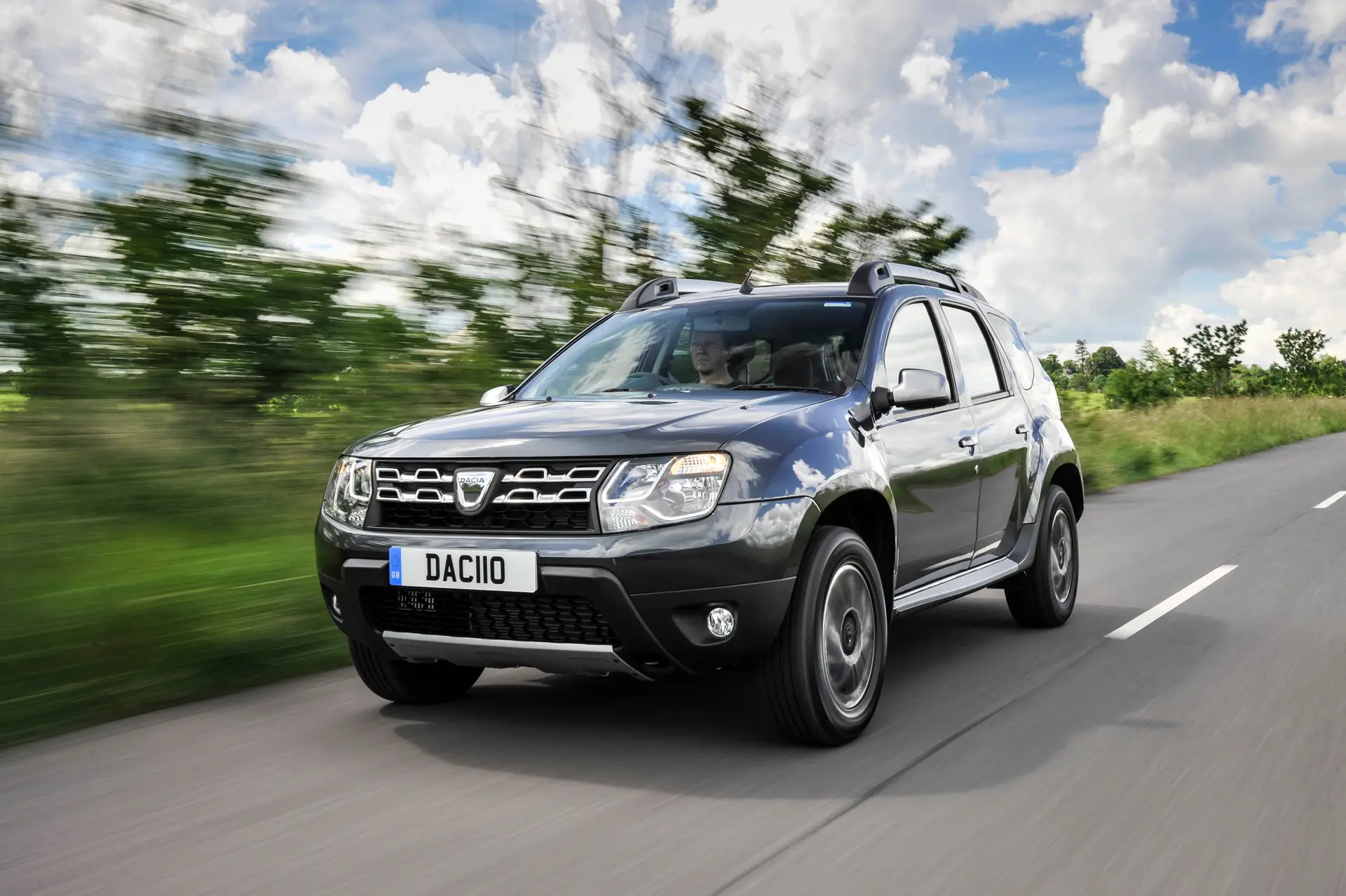 Used Dacia Duster (2012-2018) Review: exterior front three quarter photo of the Dacia Duster on the road 