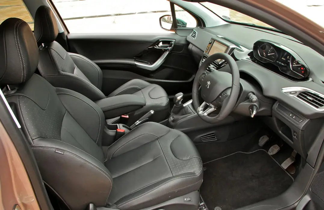 Peugeot 208 (2012-2019) Review: interior close up photo of the Peugeot 208 front seats