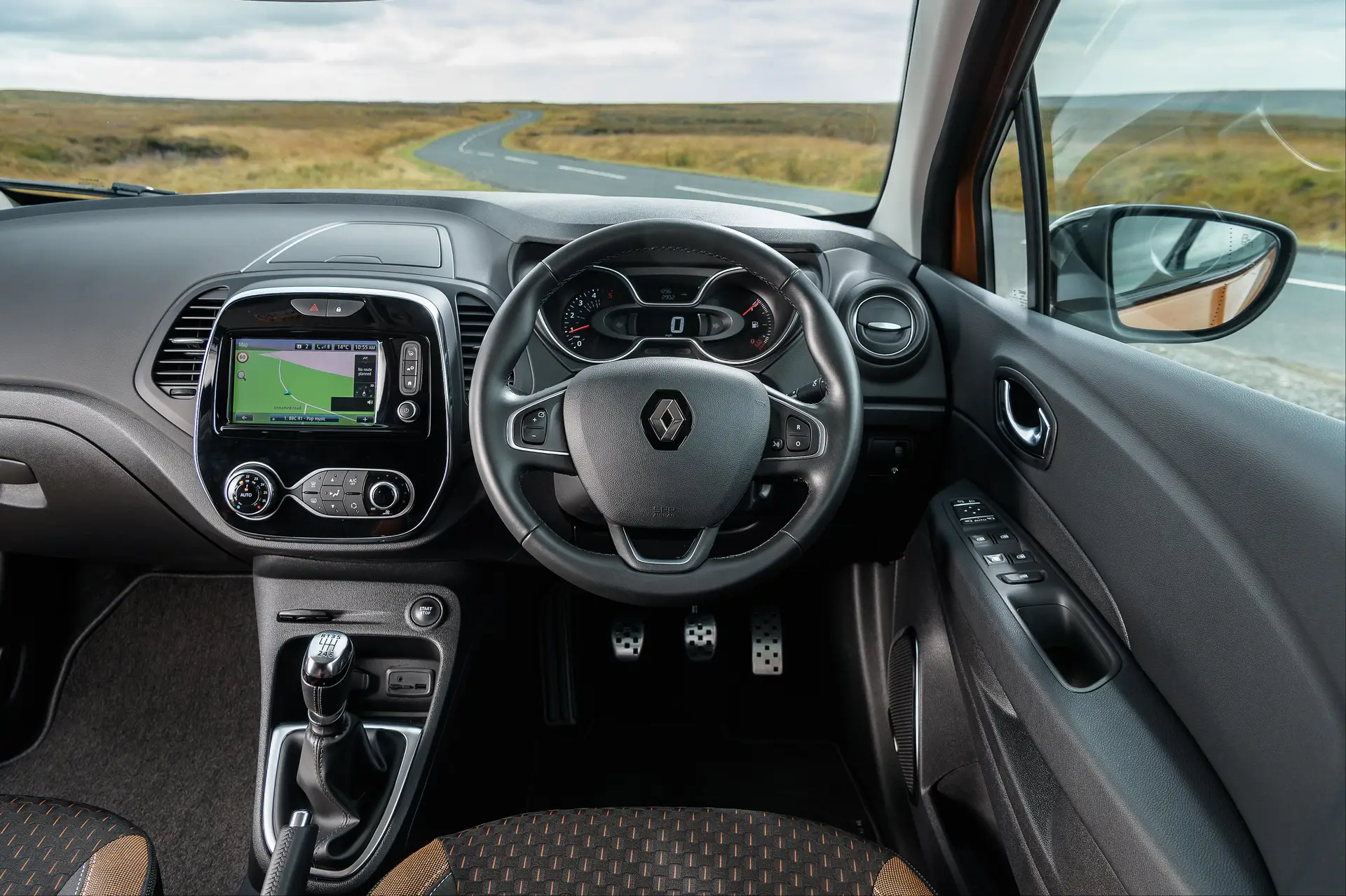 Renault Captur (2013-2019) Review: interior close up photo of the Renault Captur dashboard