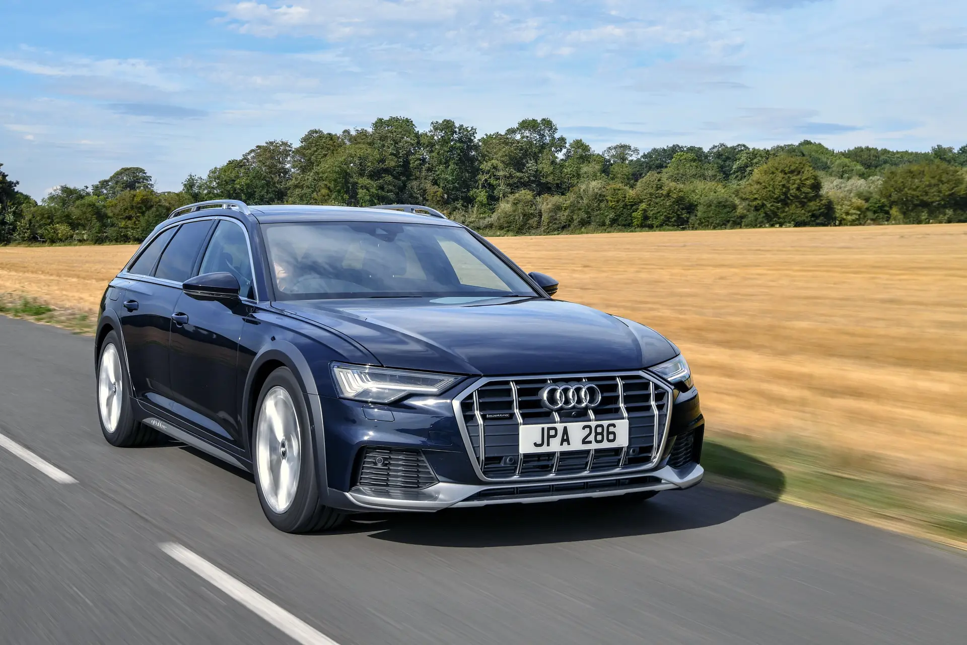 Audi A6 Allroad Review 2023: exterior front three quarter photo of the Audi A6 Allroad on the road