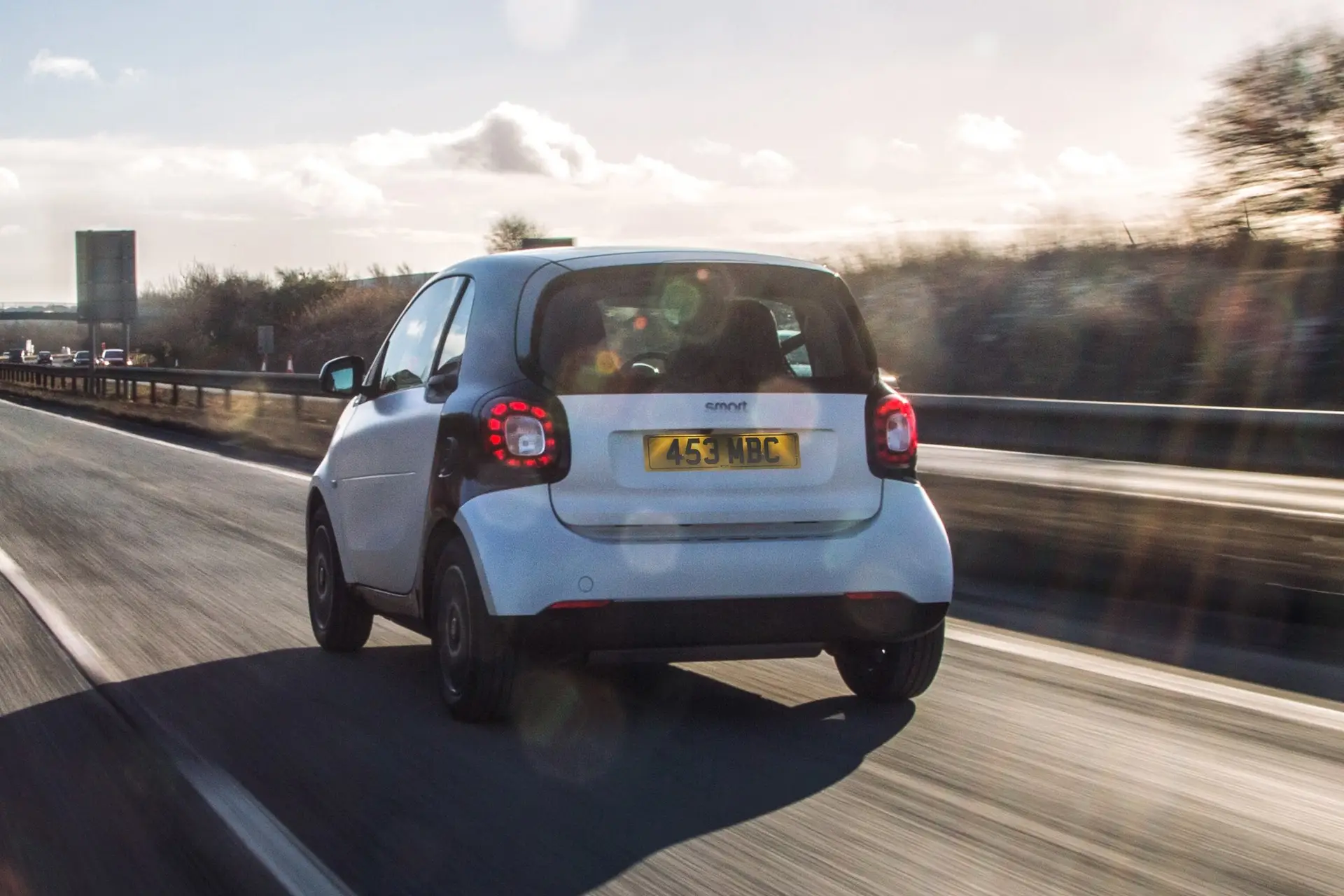 Smart Fortwo Coupe (2014-2019) Review: exterior rear three quarter photo of the Smart Fortwo Coupe on the road