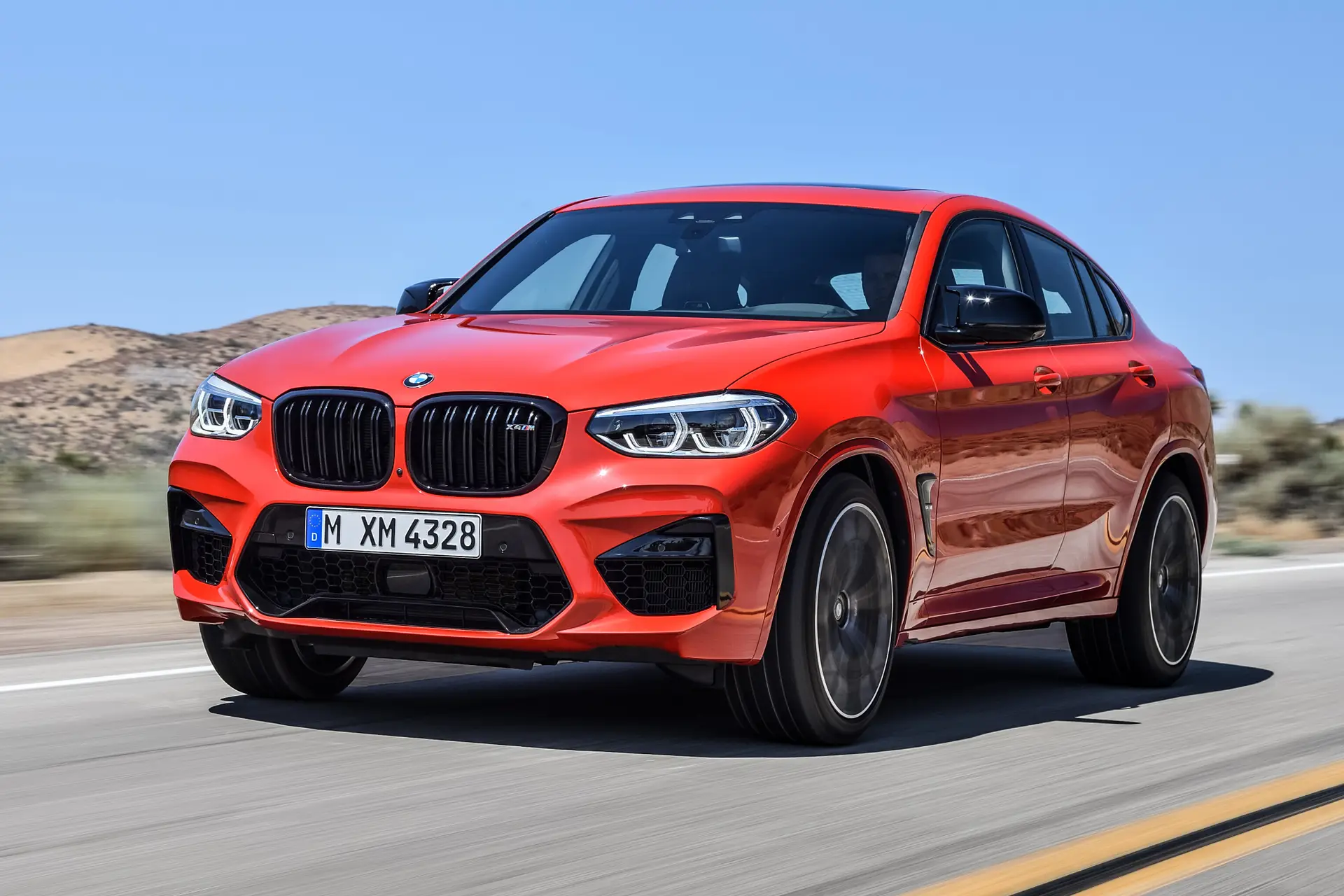 BMW X4 M Competition Review 2023 dynamic front-three quarter