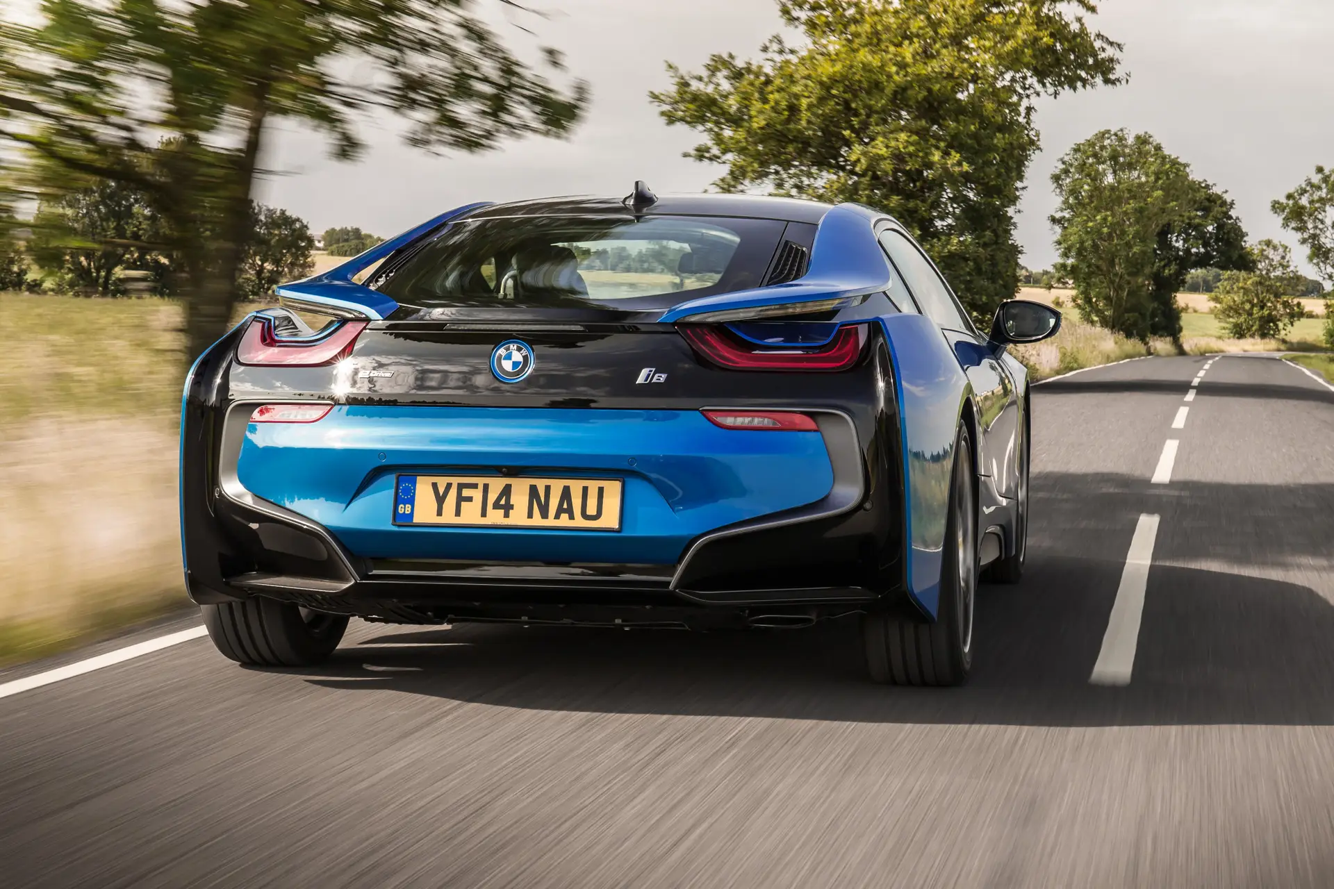 BMW i8 (2014-2020) Review: exterior rear photo of the BMW i8 on the road 
