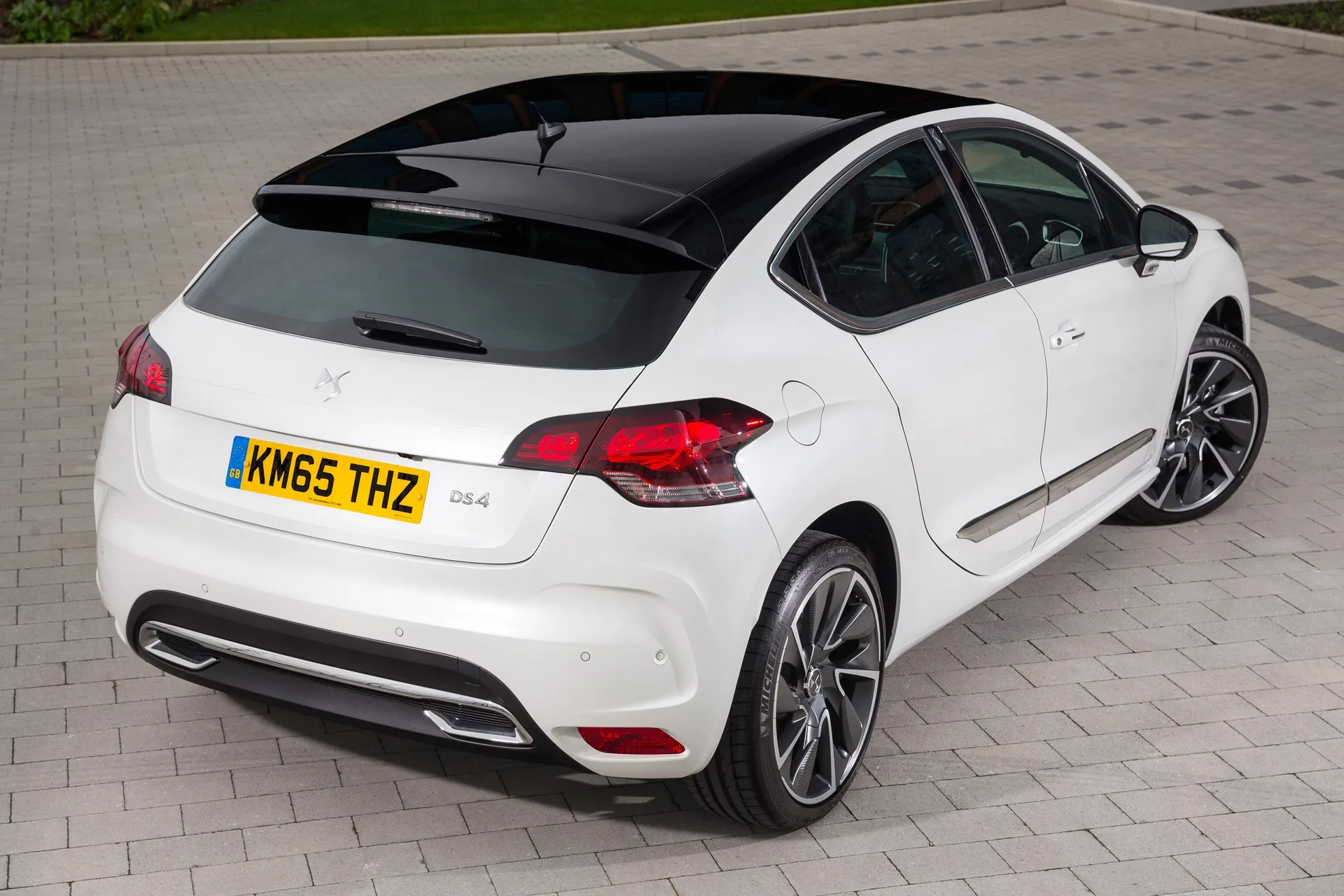DS4 (2011-2018) Review: Exterior rear three quarter photo of the DS4 on the road