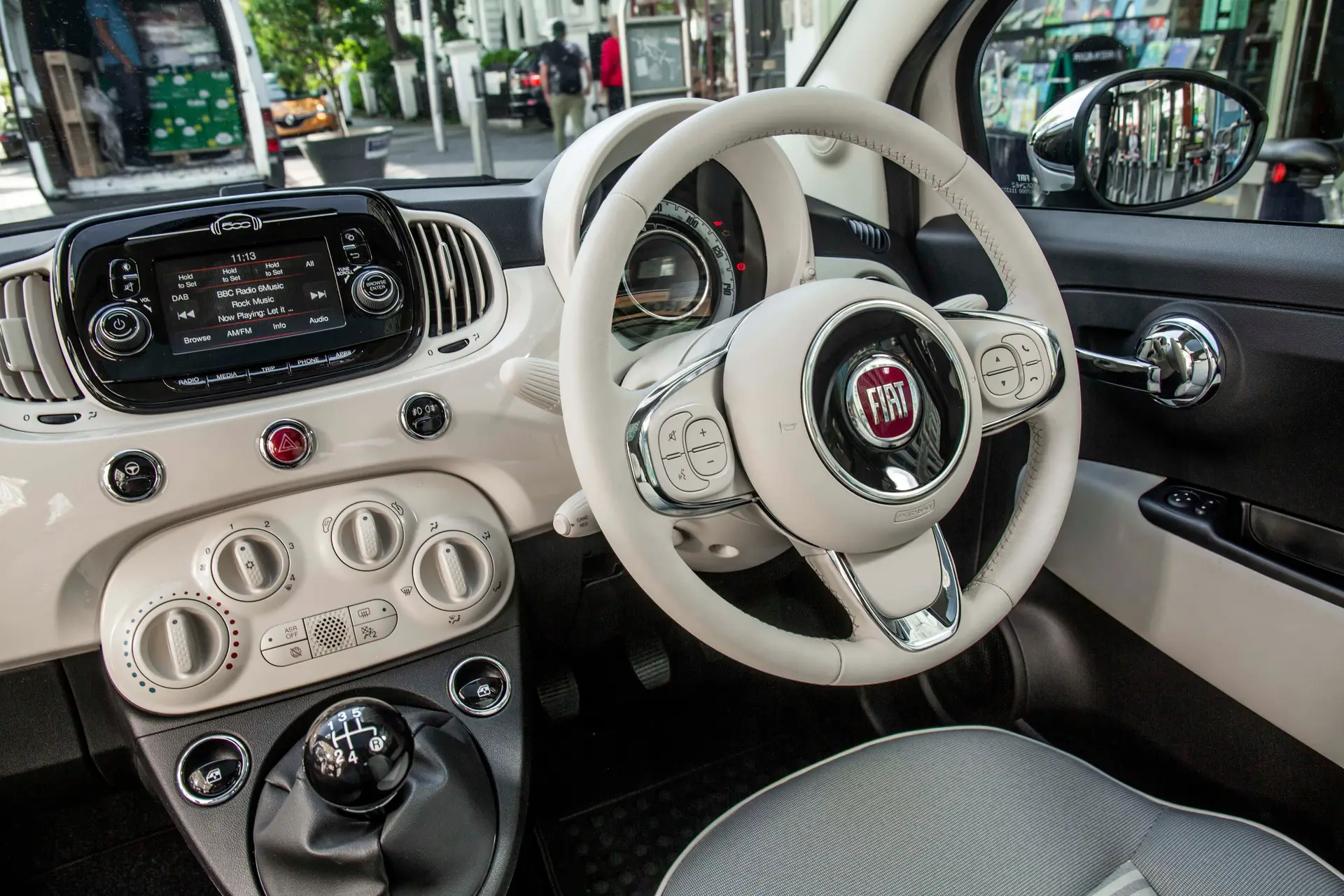 Fiat 500 Review 2024: interior cream steering wheel