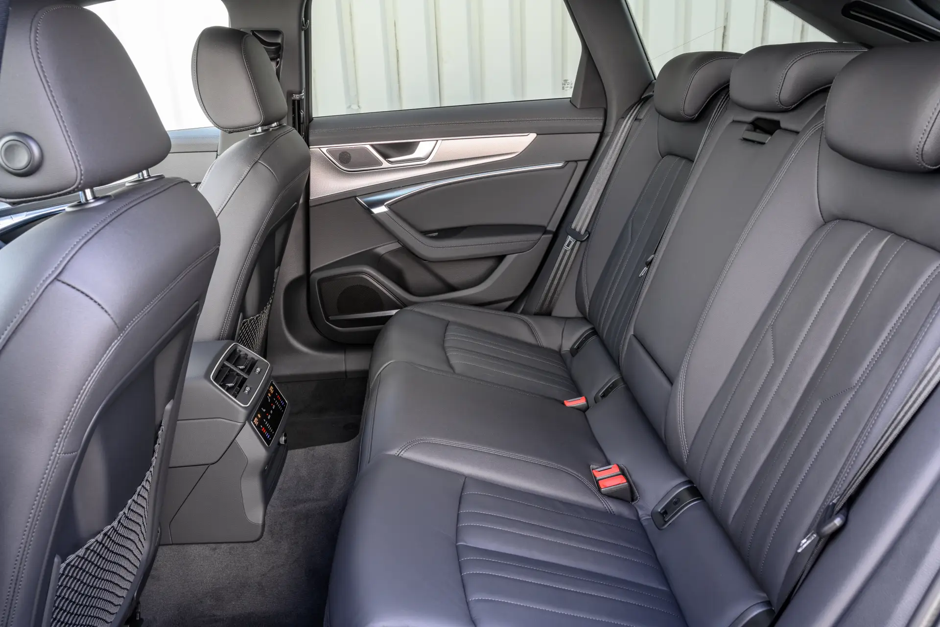 Audi A6 Allroad Review 2023: interior close up photo of the Audi A6 Allroad rear seats