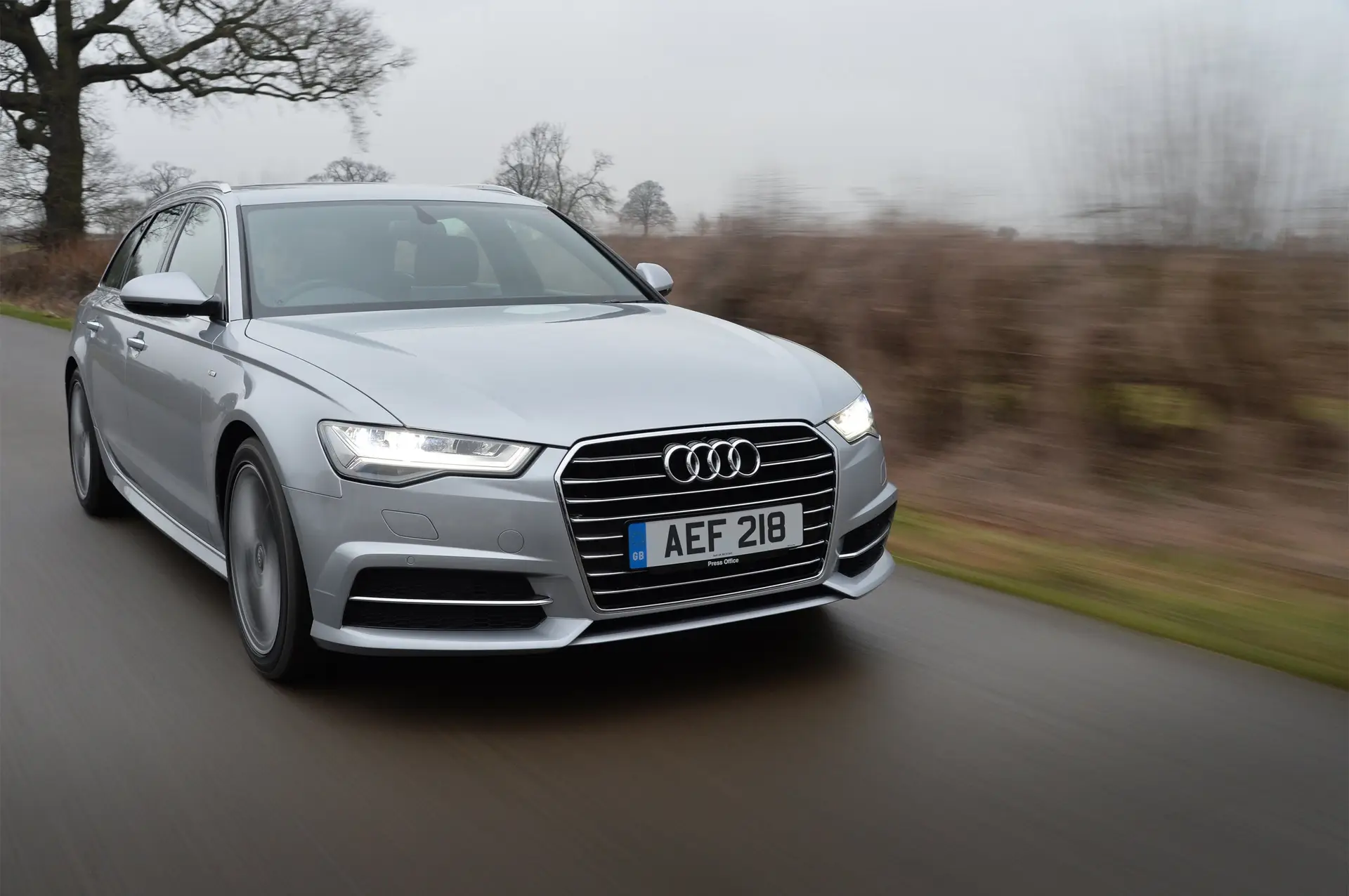 Audi A6 Avant (2011-2018) Review: exterior front three quarter photo of the Audi A6 Avant on the road
