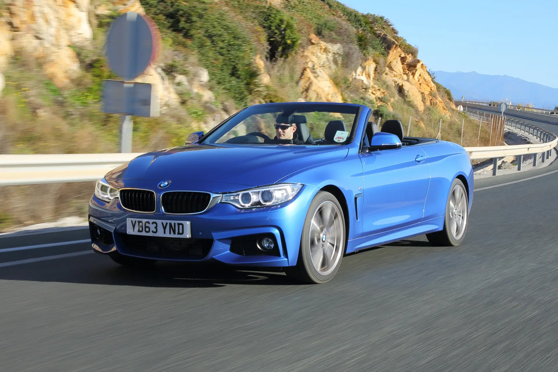 BMW 4 Series Convertible (2014-2020) Review: exterior front three quarter photo of the BMW 4 Series Convertible on the road