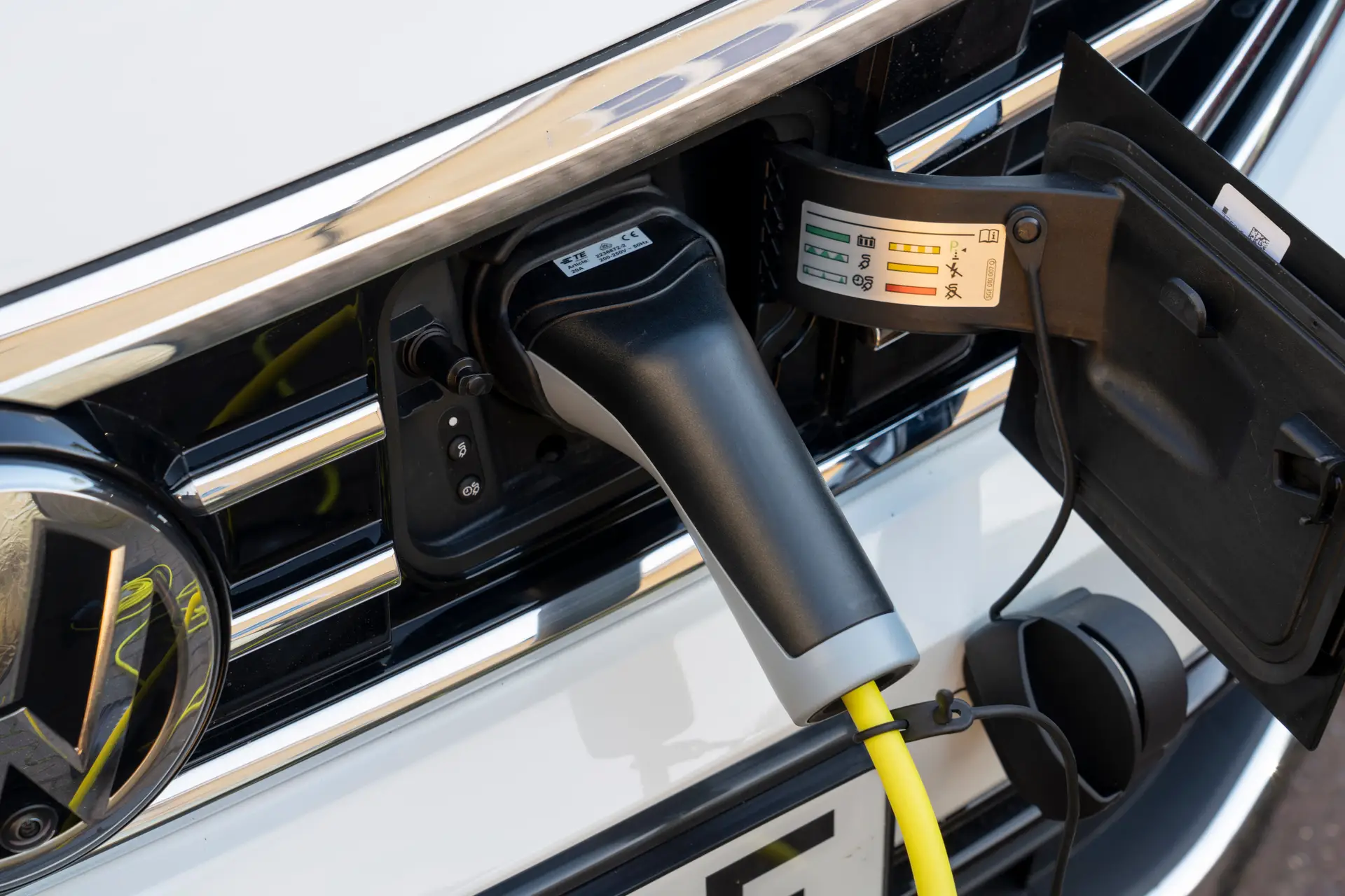 Volkswagen Passat GTE Review 2023: exterior close up photo of the Volkswagen Passat GTE charging port