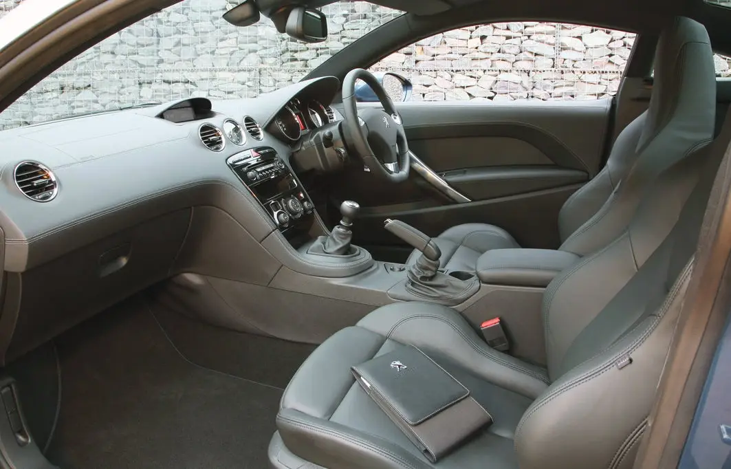 Peugeot RCZ (2010-2015) Review: interior close up photo of the Peugeot RCZ dashboard