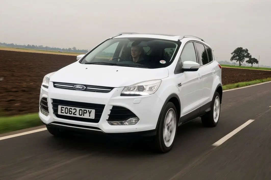 Ford Kuga (2013-2020) Review: exterior front three quarter photo of the Ford Kuga on the road 