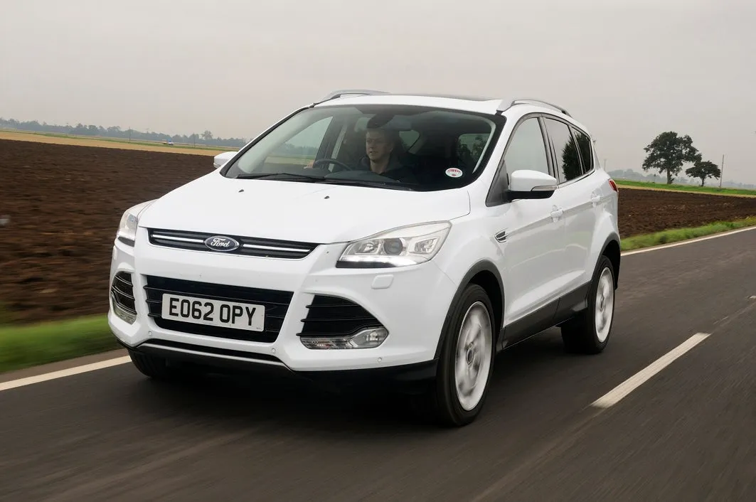 Ford Kuga (2013-2020) Review: exterior front three quarter photo of the Ford Kuga on the road