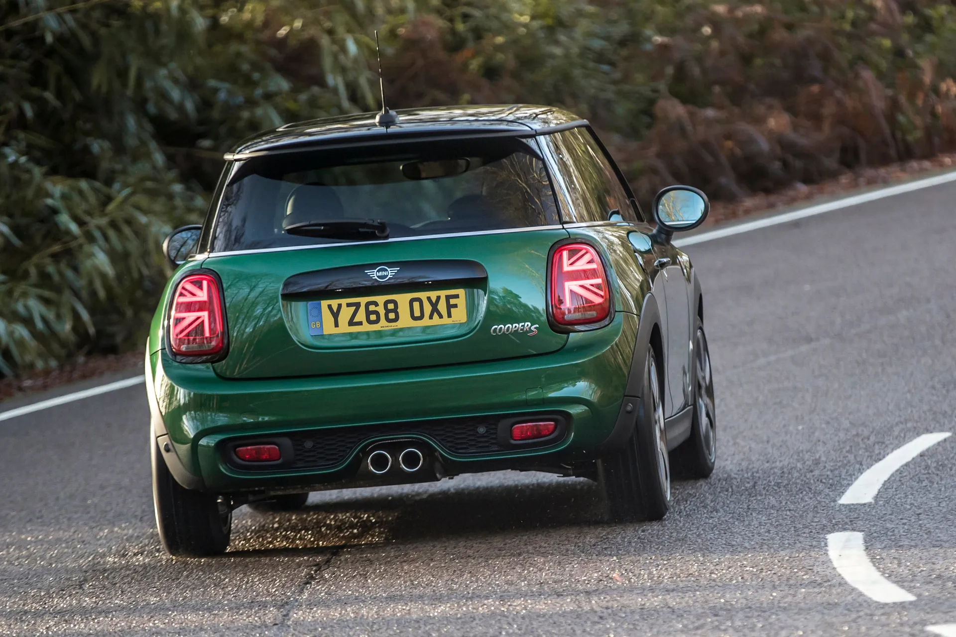 MINI Hatch (2014-2024) Review: exterior rear three quarter photo of the MINI Hatch 3-door on the road