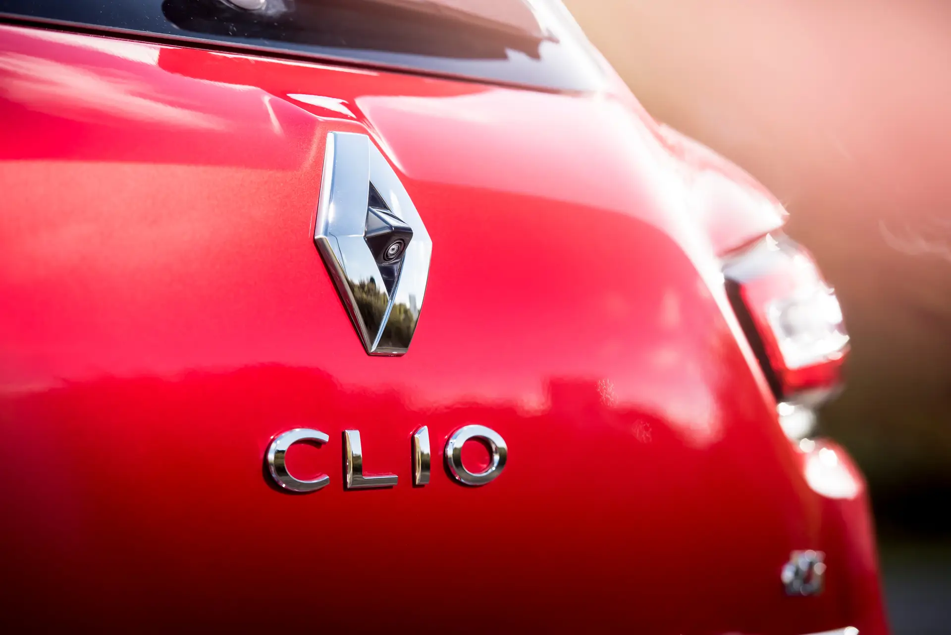 Renault Clio (2013-2019) Review: exterior close up photo of the Renault Clio rear badge