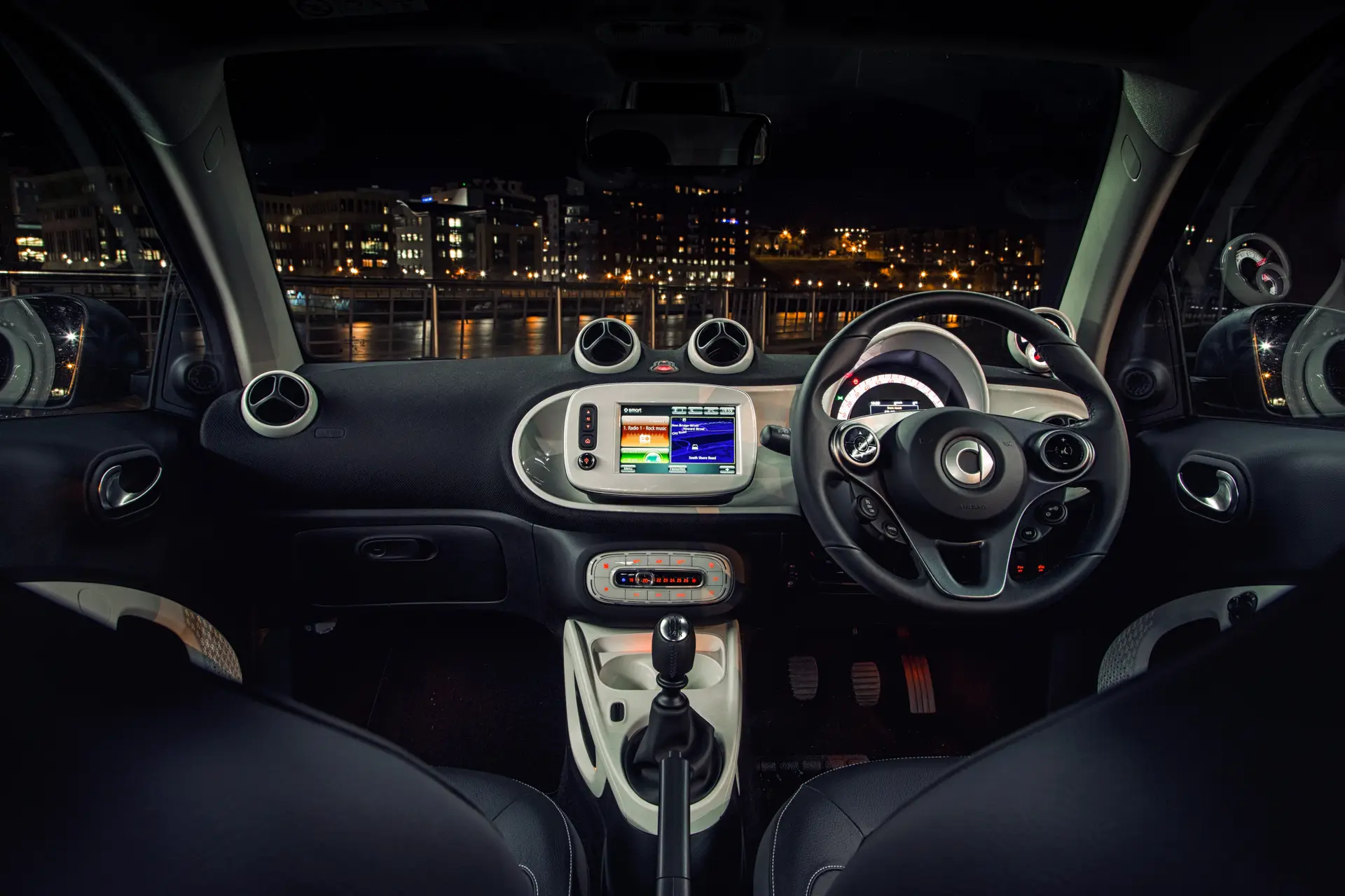 Smart Fortwo Coupe (2014-2019) Review: interior close up photo of the Smart Fortwo Coupe dashboard