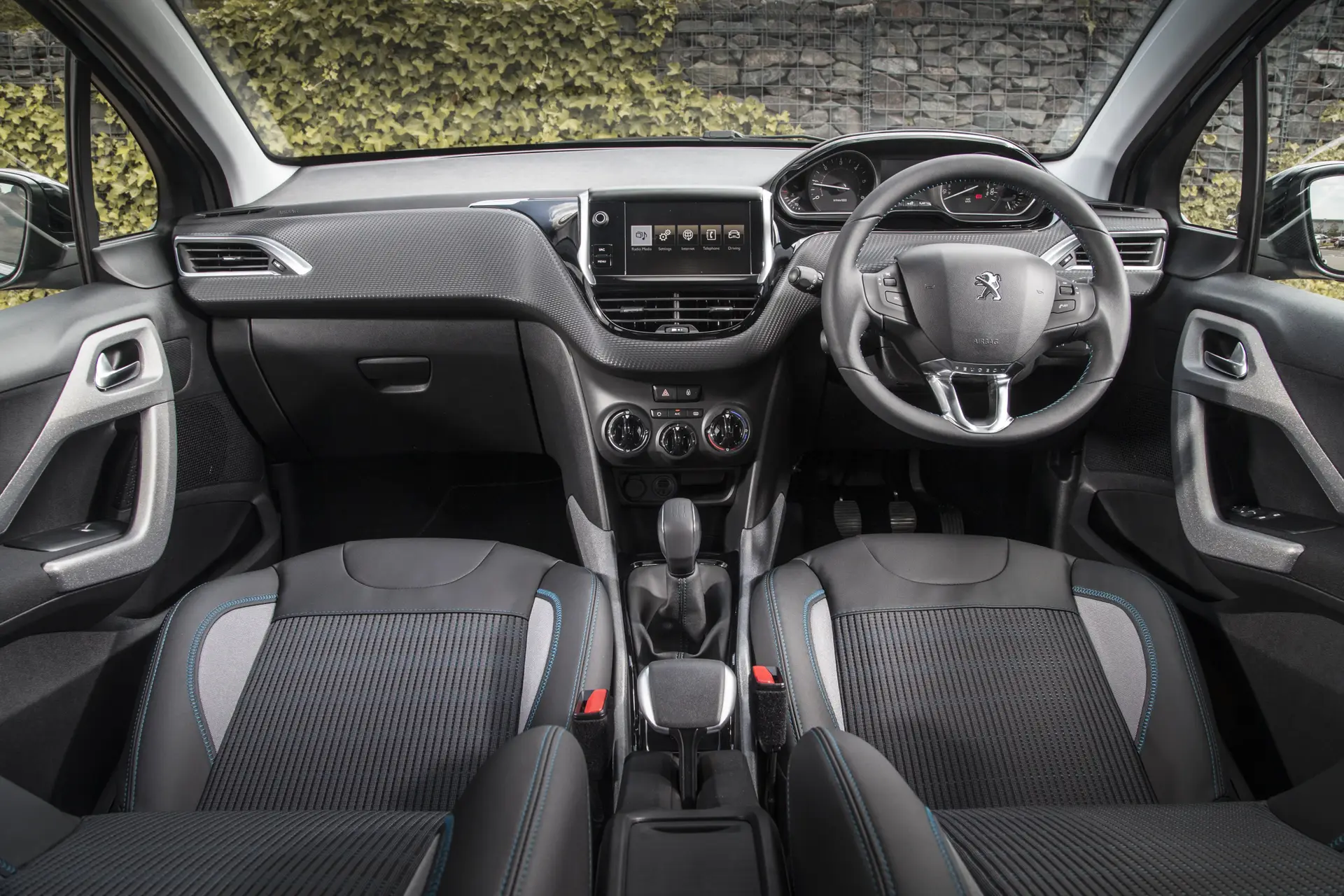 Peugeot 2008 (2013-2019) Review: interior close up photo of the Peugeot 2008 dashboard