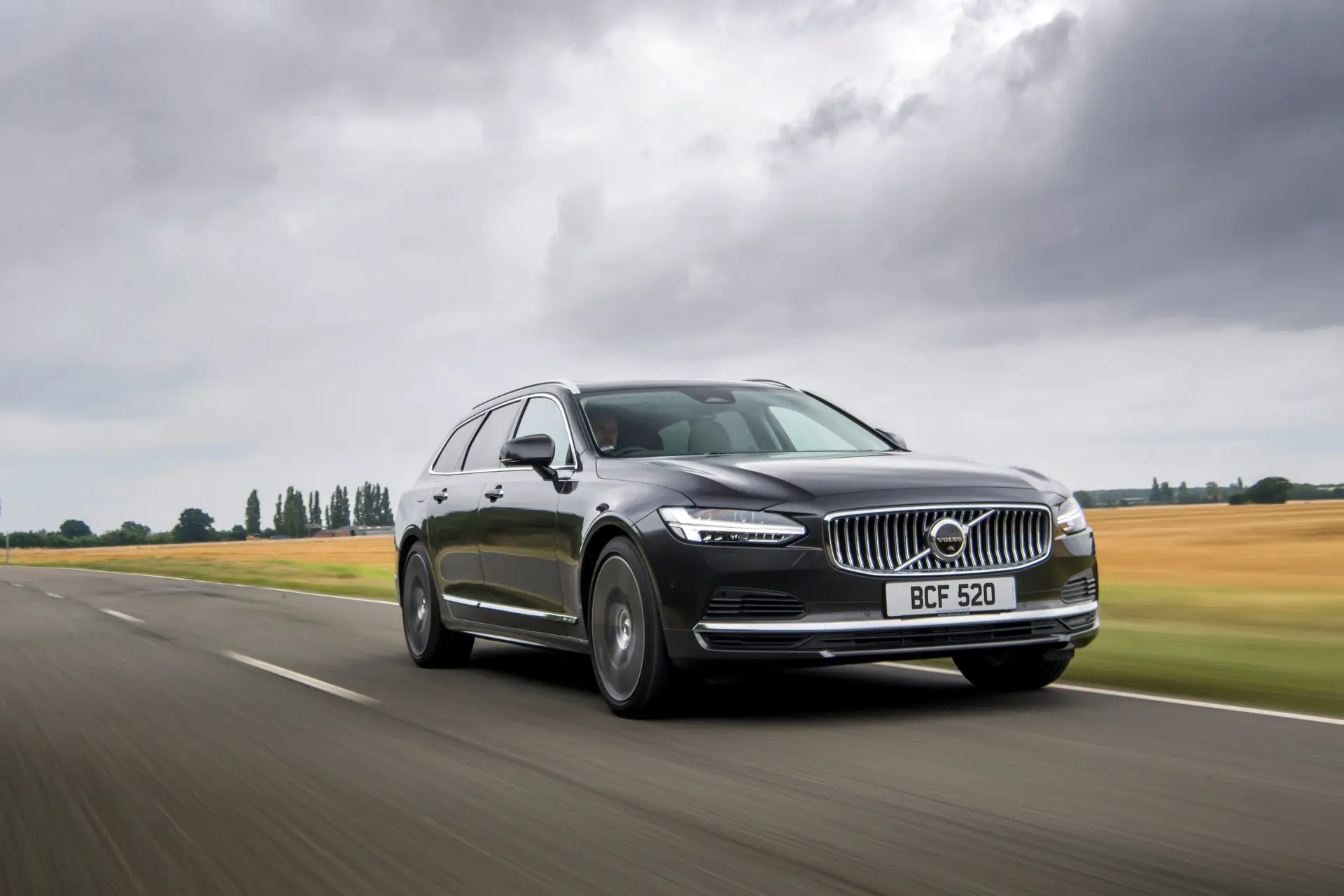 Volvo V90 Review 2023: exterior front three quarter photo of the Volvo V90 on the road
