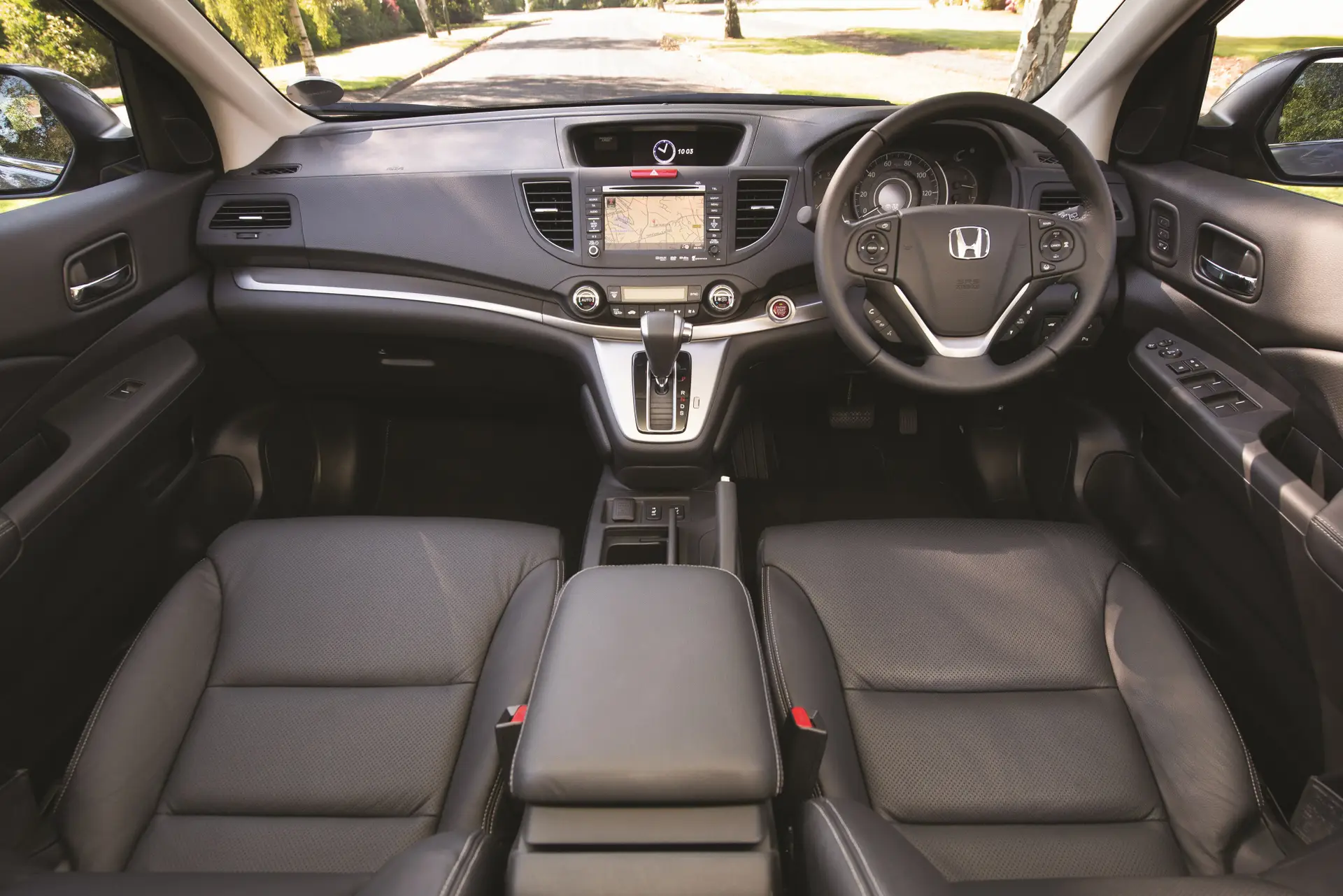 Honda CR-V (2012-2018) Review: interior close up photo of the Honda CR-V dashboard