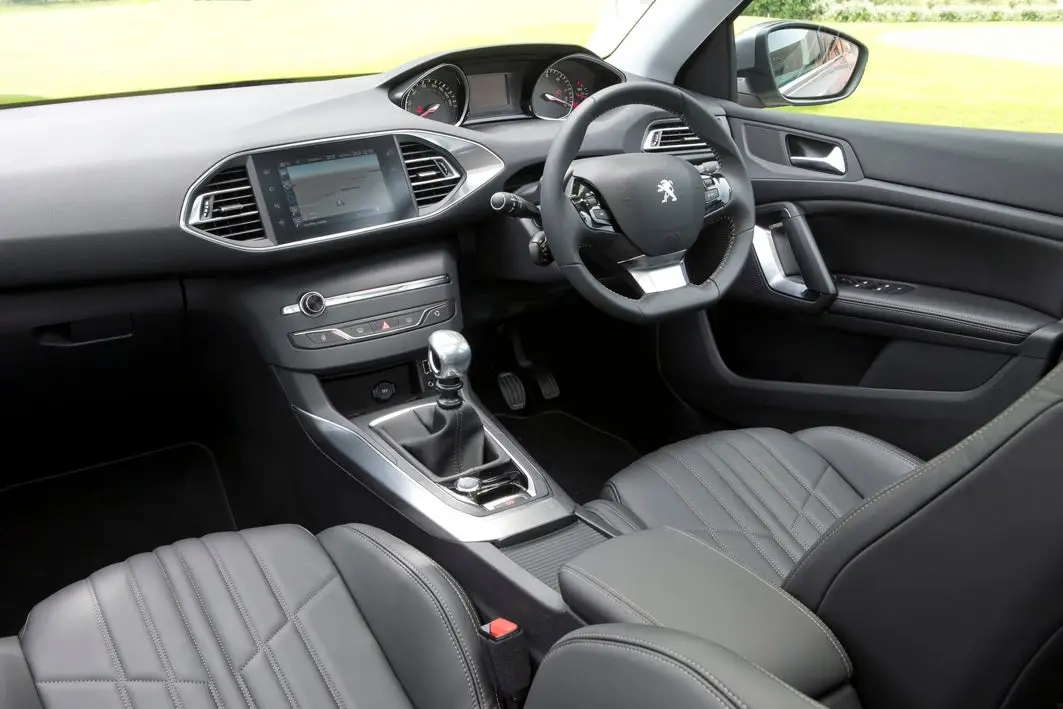 Peugeot 308 SW (2014-2021) Review: interior close up photo of the Peugeot 308 SW dashboard