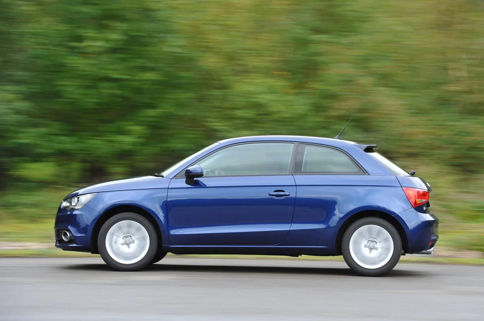Audi A1 (2010-2018) Review: exterior side photo of the Audi A1 on the road