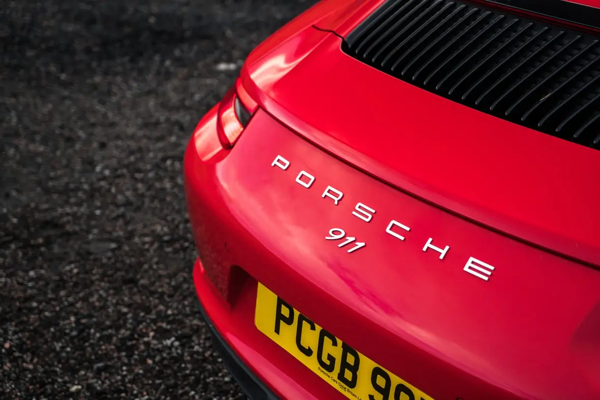 Porsche 911 (2015-2019) Review: exterior close up photo of the Porsche 911 rear badge