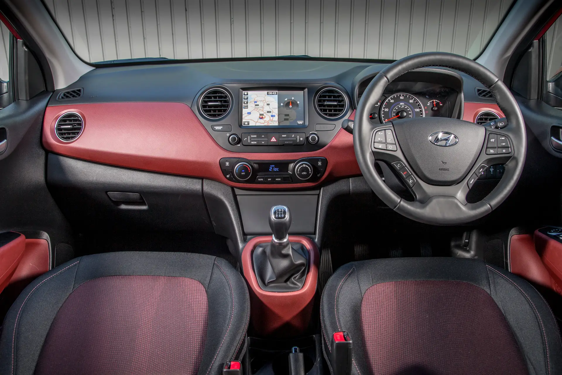 Hyundai i10 (2014-2020) Review: interior close up photo of the Hyundai i10 dashboard