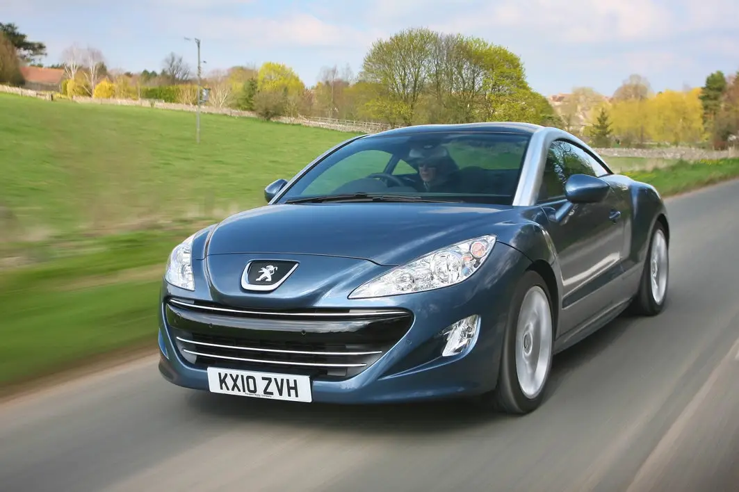 Peugeot RCZ (2010-2015) Review: exterior front three quarter photo of the Peugeot RCZ on the road