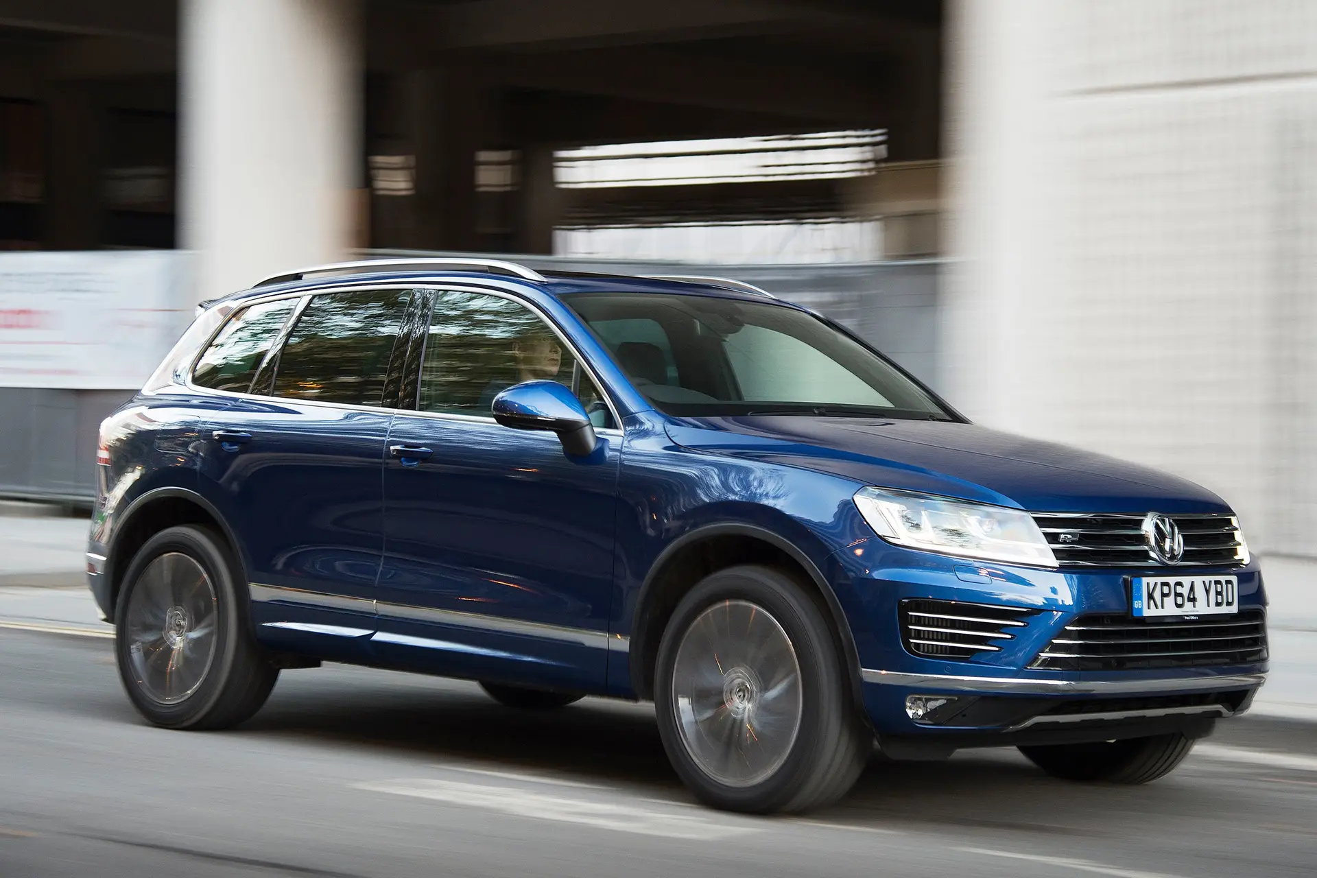  Volkswagen Touareg (2010-2018) Review: exterior front three quarter photo of the Volkswagen Touareg on the road
