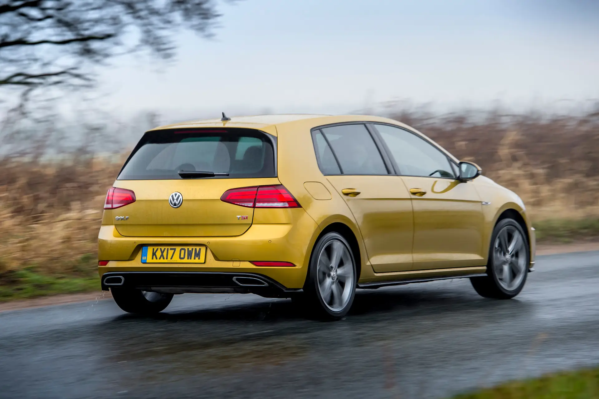 Volkswagen Golf (2013-202) Review: exterior rear three quarter photo of the Volkswagen Golf on the road