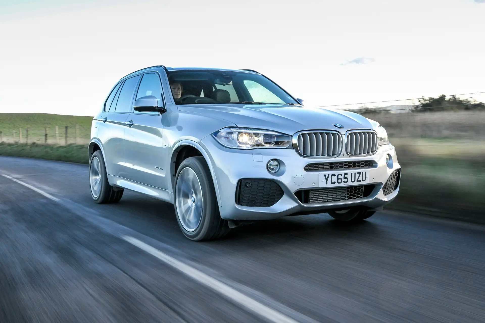 BMW X5 (2014-2018) Review:  Exterior front three quarter photo of the BMW X5 on the road