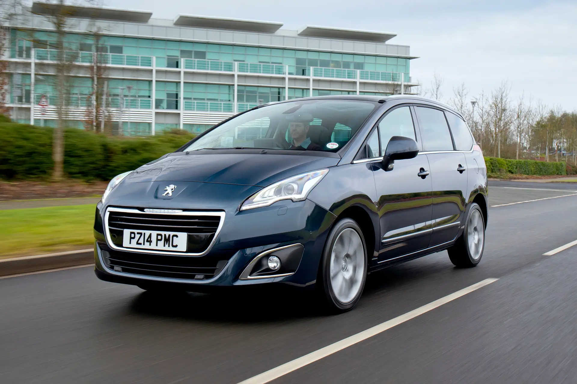 Peugeot 5008 (2010-2018) Review: exterior front three quarter photo of the Peugeot 5008 on the road