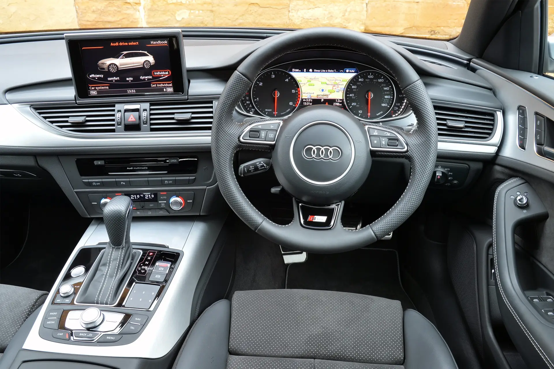 Audi A6 Avant (2011-2018) Review: interior close up photo of the Audi A6 Avant dashboard