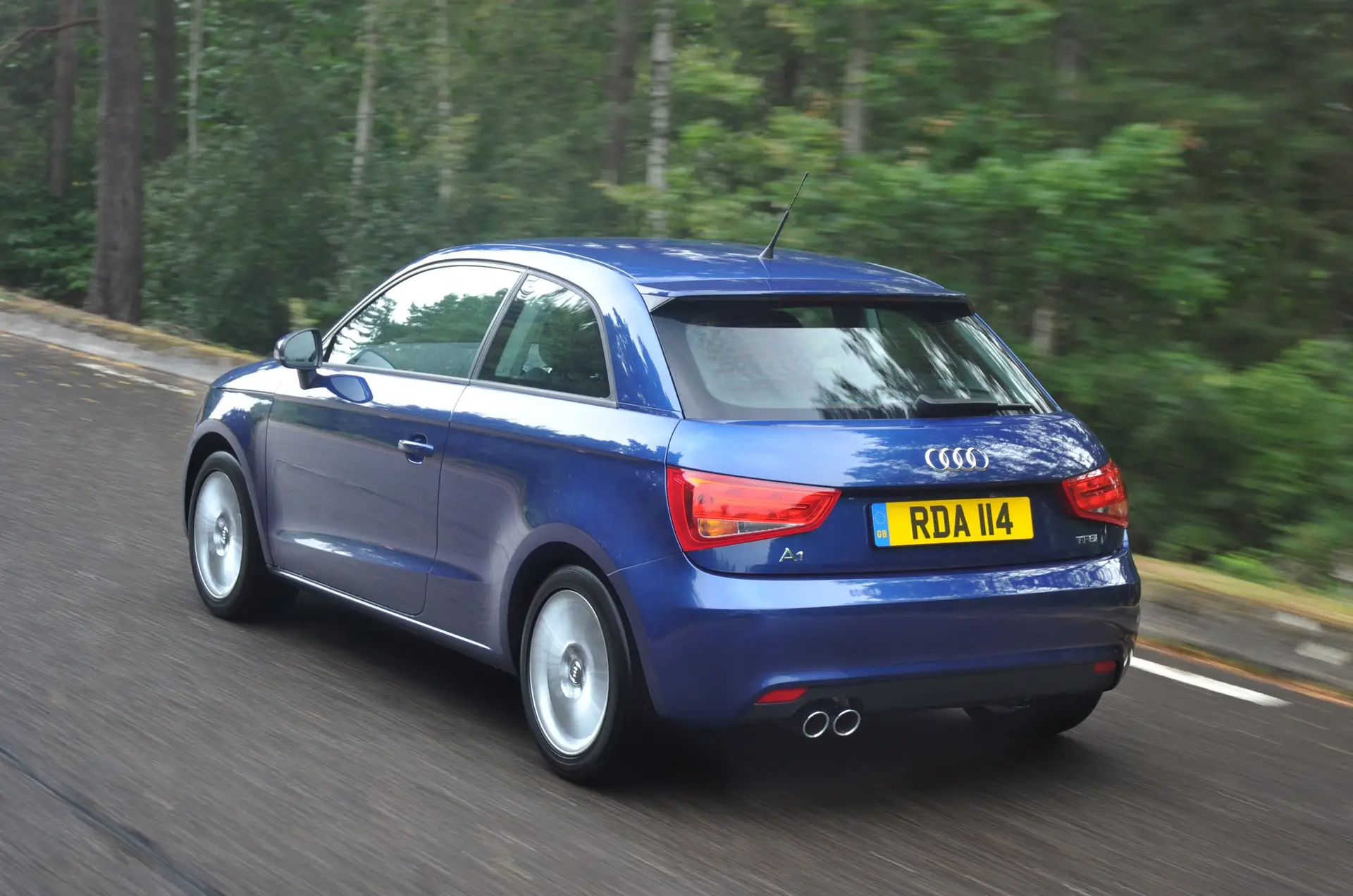 Audi A1 (2010-2018) Review: exterior rear three quarter photo of the Audi A1 on the road