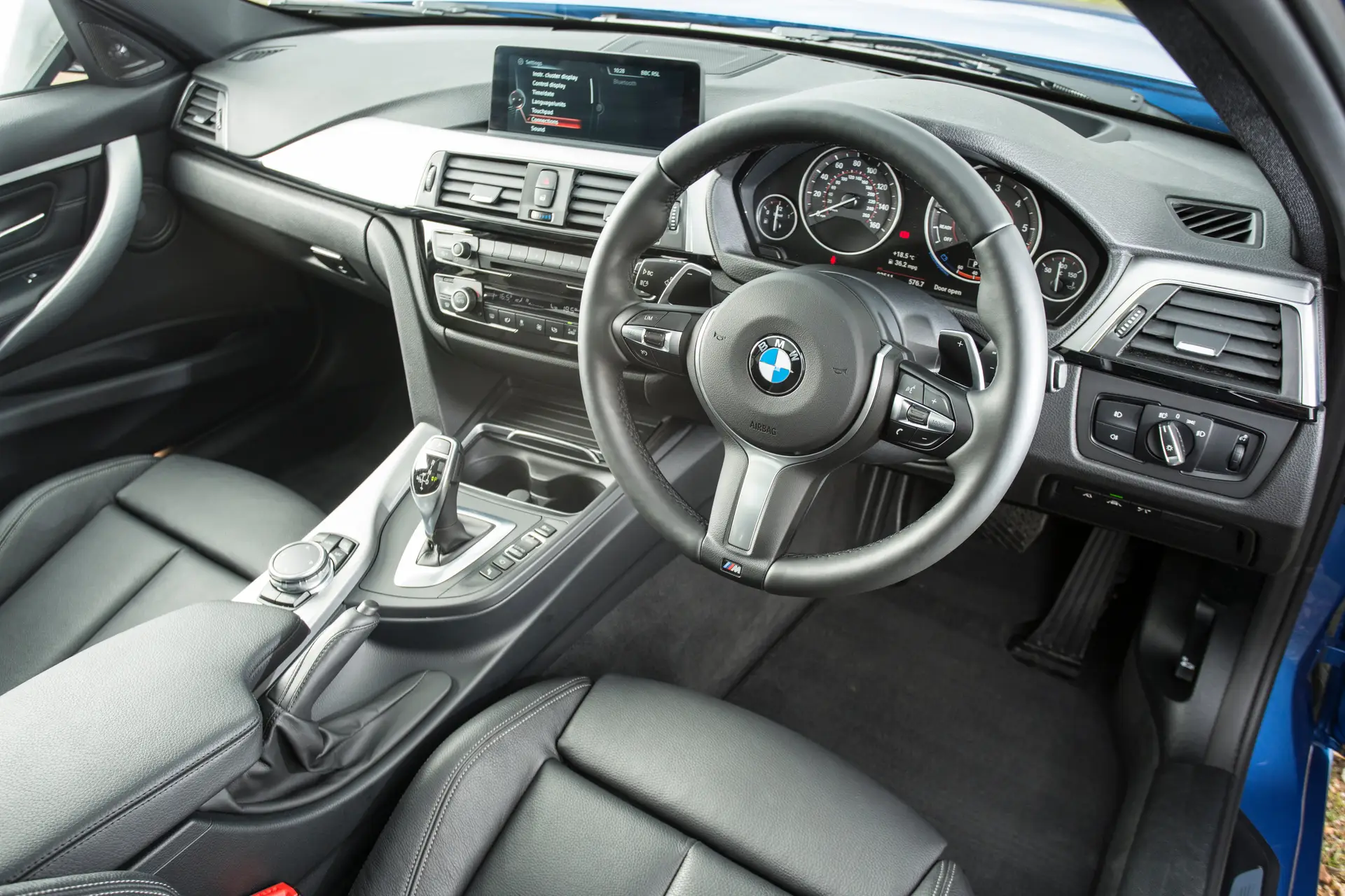BMW 3 Series Touring (2012-2019) Review: interior close up photo of the BMW 3 Series Touring dashboard