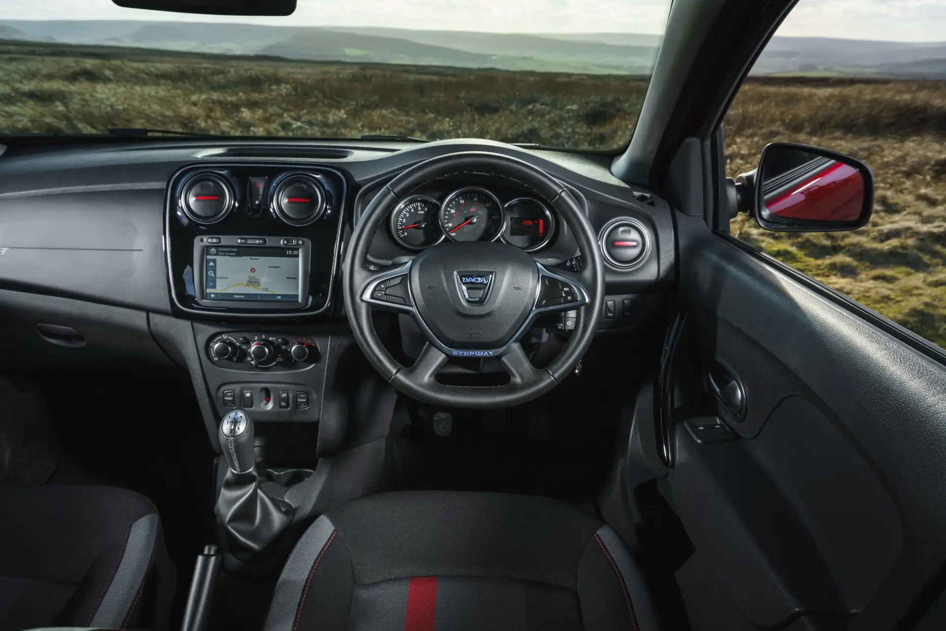 Dacia Sandero Stepway (2013-2021) Review: interior close up photo of the Dacia Sandero Stepway dashboard