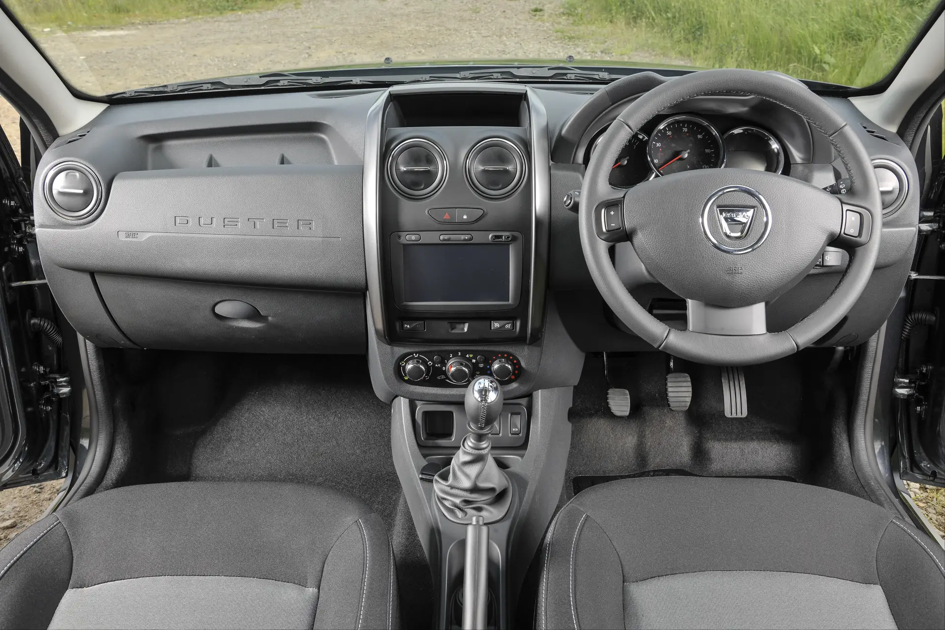 Used Dacia Duster (2012-2018) Review: interior close up photo of the Dacia Duster dashboard
