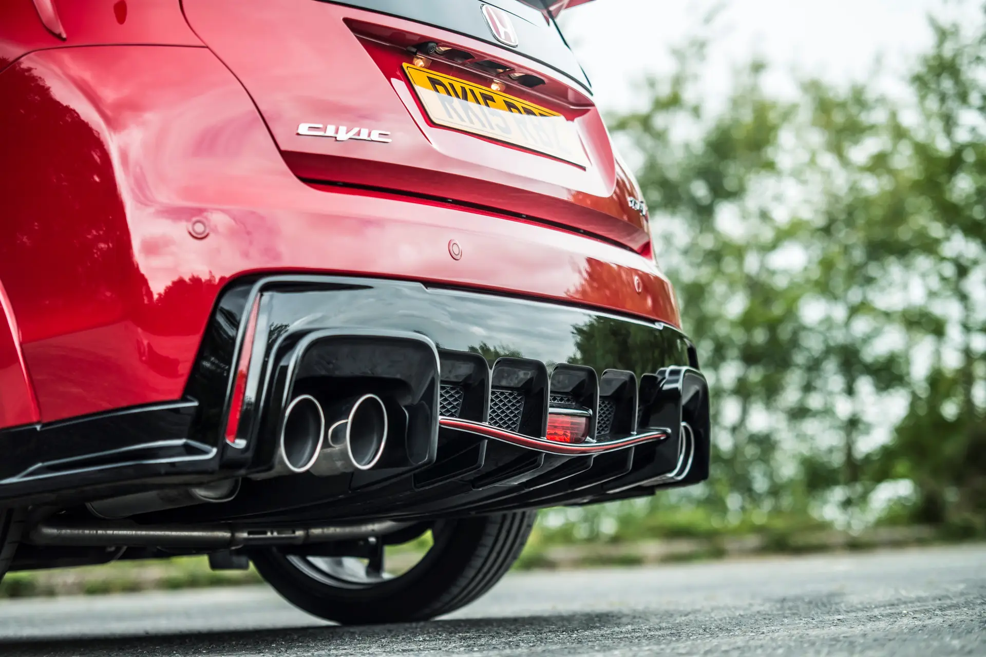 Honda Civic Type R (2015-2017) Review: exterior close up photo of the Honda Civic Type R exhausts