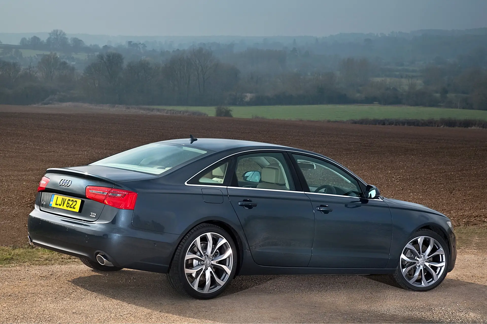 Used Audi A6 (2011-2018) Review: Exterior rear three quarter photo of the Audi A6 