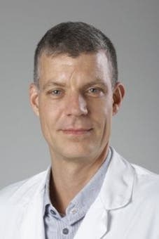 Dr.   Vrancken 