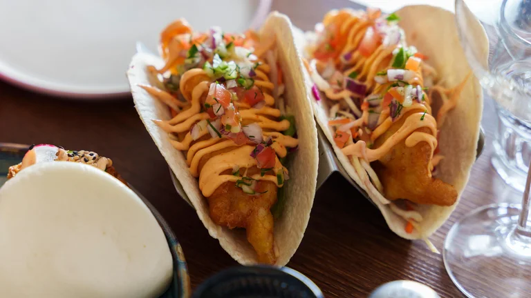 A group of tacos on a table