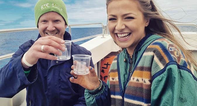 Couple enjoying a boat trip with Donegal Music Trails